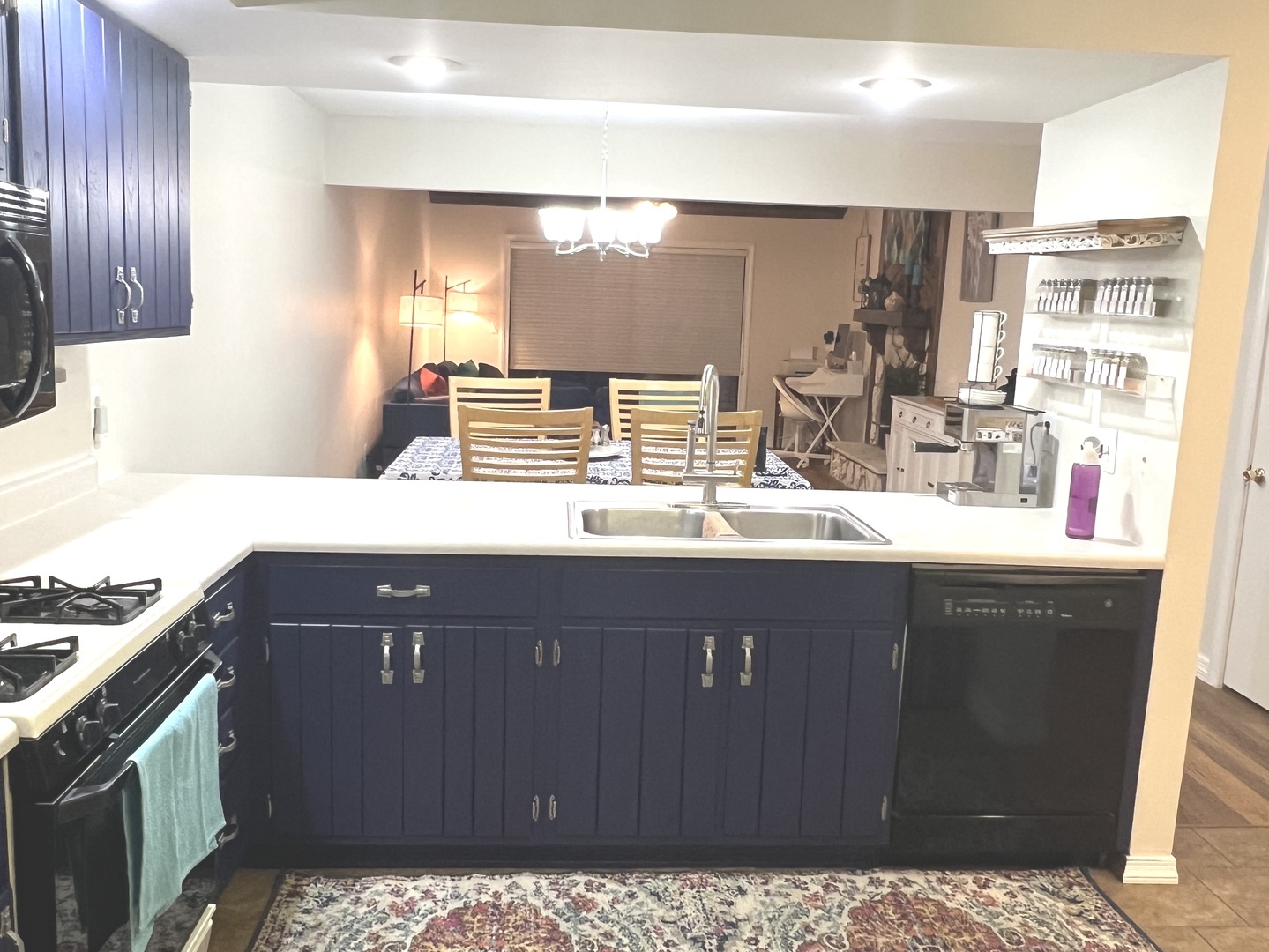 106 Spring Circle, Unit 106 Urbana, IL 61802 - Photo 4 of 18 a kitchen with a sink a stove and cabinets