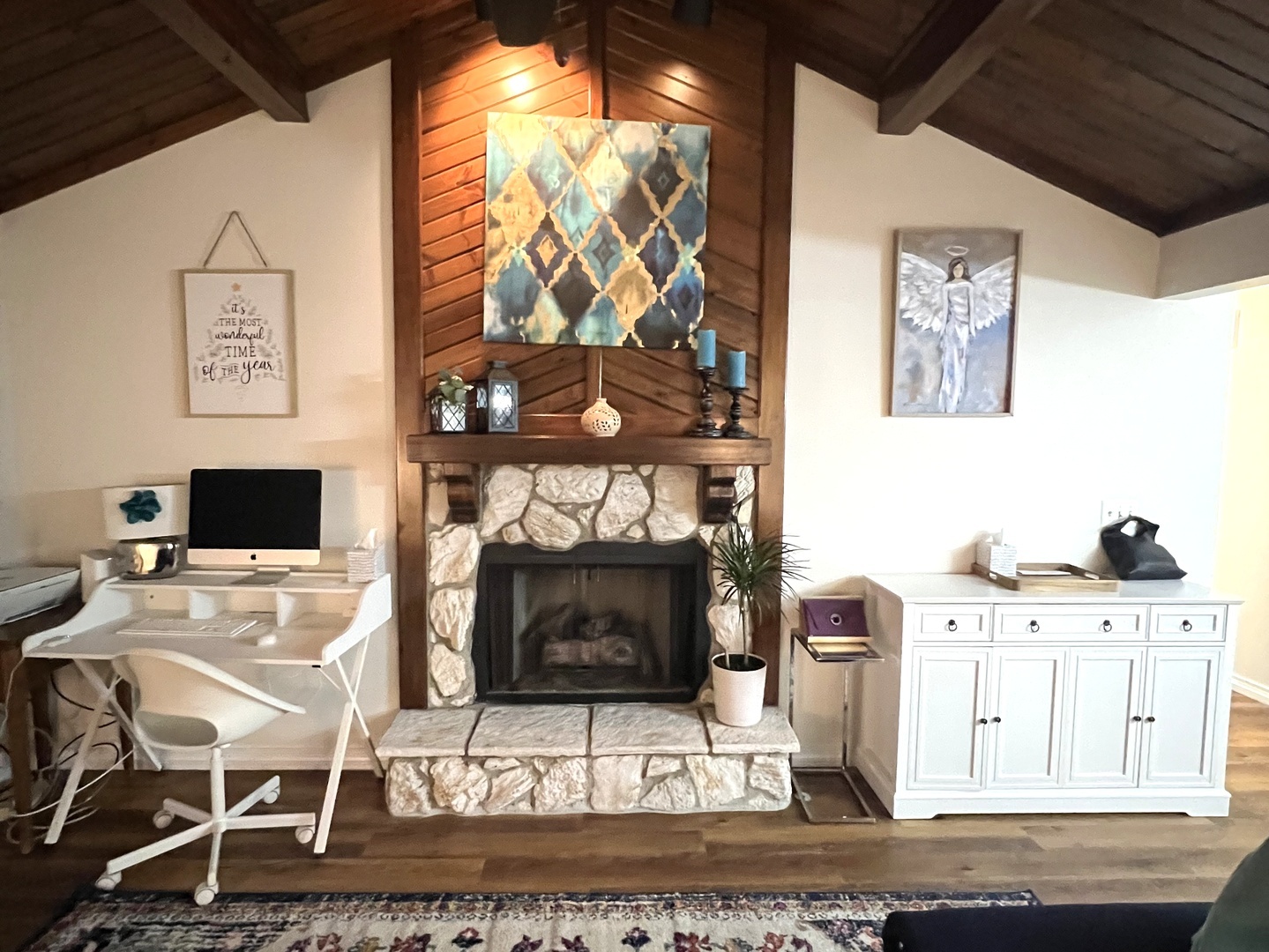 106 Spring Circle, Unit 106 Urbana, IL 61802 - Photo 9 of 18 a living room with furniture a fireplace and a flat screen tv