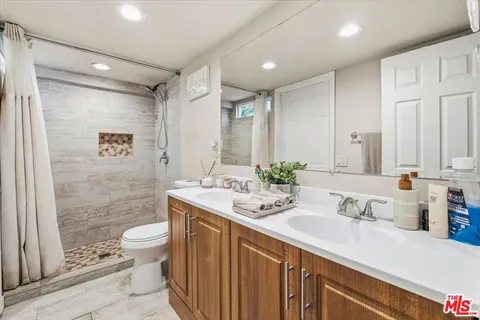 a view of house with swimming pool outdoor seating