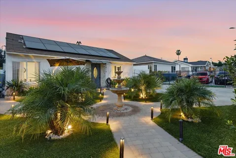 a house view with a garden space