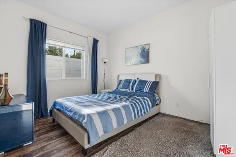 a view of storage and utility room with washer and dryer