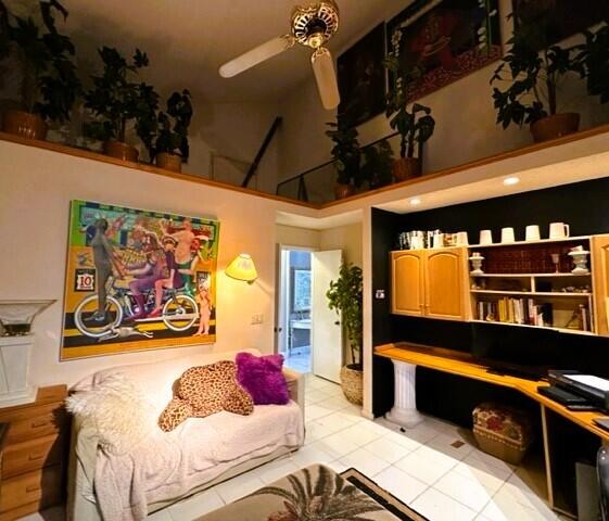 150 Cape Pointe Circle Jupiter, FL 33477 - Photo 16 of 22 a bedroom with a bed window and wall paintings