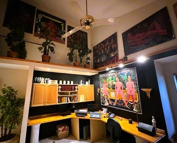 150 Cape Pointe Circle Jupiter, FL 33477 - Photo 17 of 22 a room with gym equipment and a potted plant