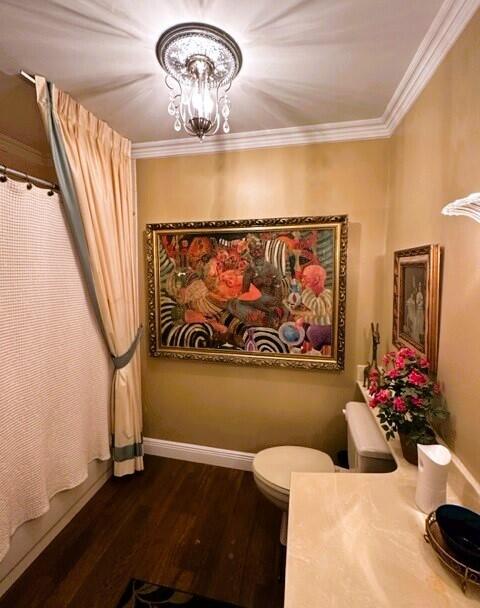 150 Cape Pointe Circle Jupiter, FL 33477 - Photo 19 of 22 a view of room with painting on the wall and a potted plant