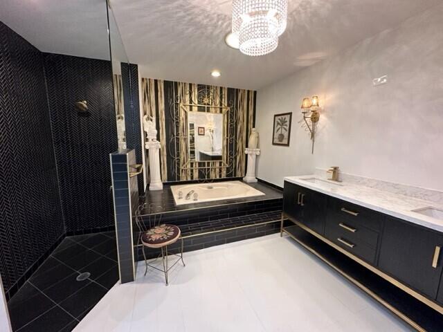 150 Cape Pointe Circle Jupiter, FL 33477 - Photo 10 of 22 a spacious bathroom with a tub shower and sink