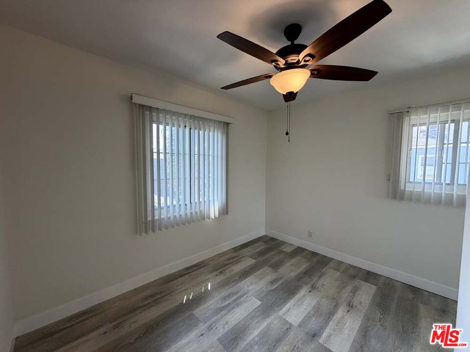 8818 Ramsgate Avenue, Unit 8822 1/2 Los Angeles, CA 90045 - Photo 19 of 20 a view of room with a ceiling fan