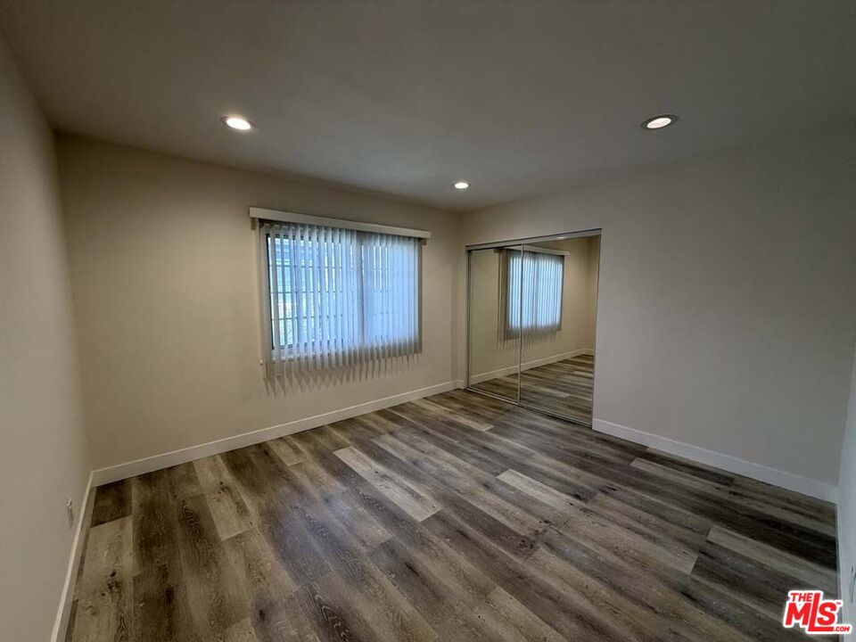 8818 Ramsgate Avenue, Unit 8822 1/2 Los Angeles, CA 90045 - Photo 9 of 20 a view of an empty room and window