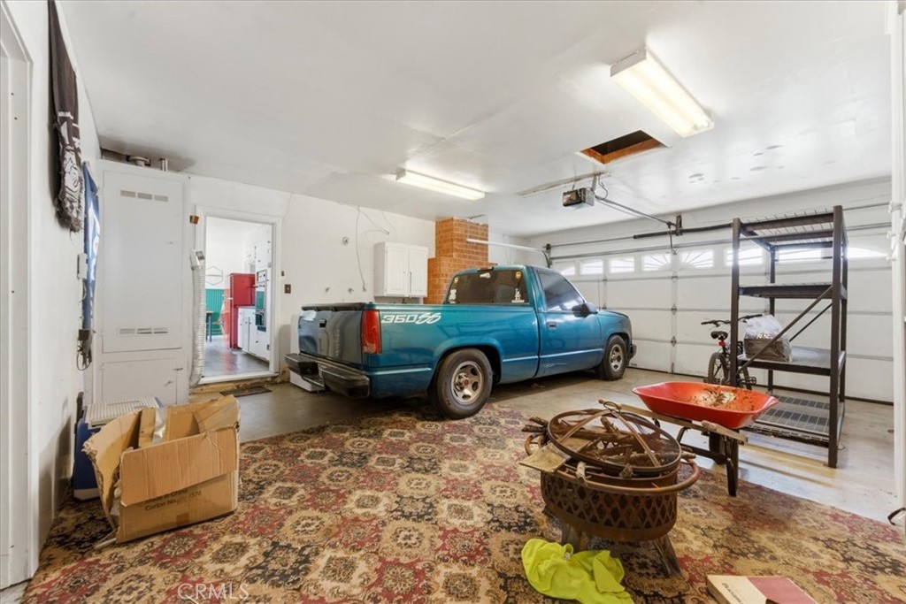 34863 Wildwood Canyon Road Yucaipa, CA 92399 - Photo 21 of 22 a view of a cars park in front of house
