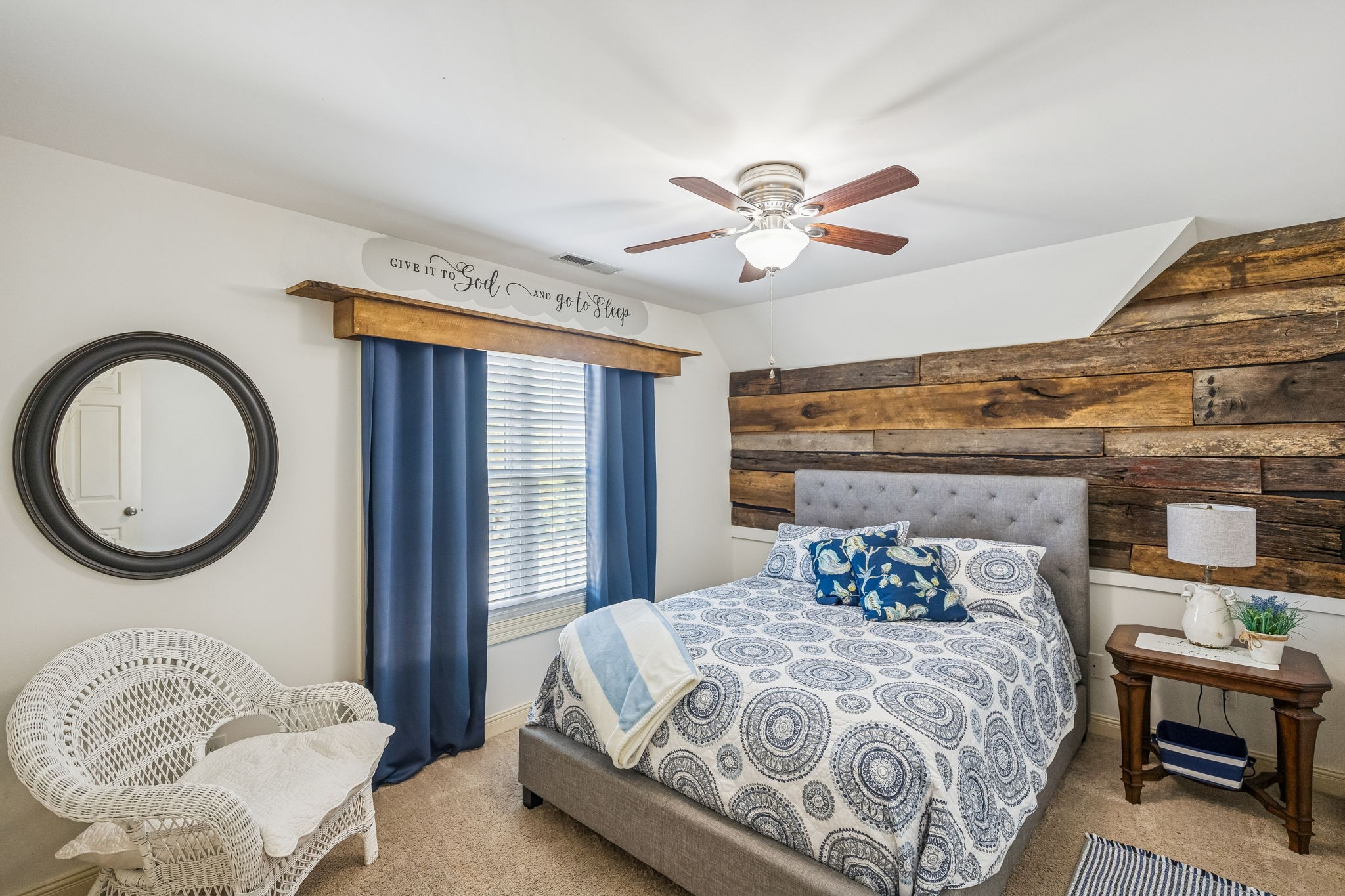 2172 Alexander Boulevard Murfreesboro, TN 37130 - Photo 26 of 46 a bedroom with a large bed and a chandelier