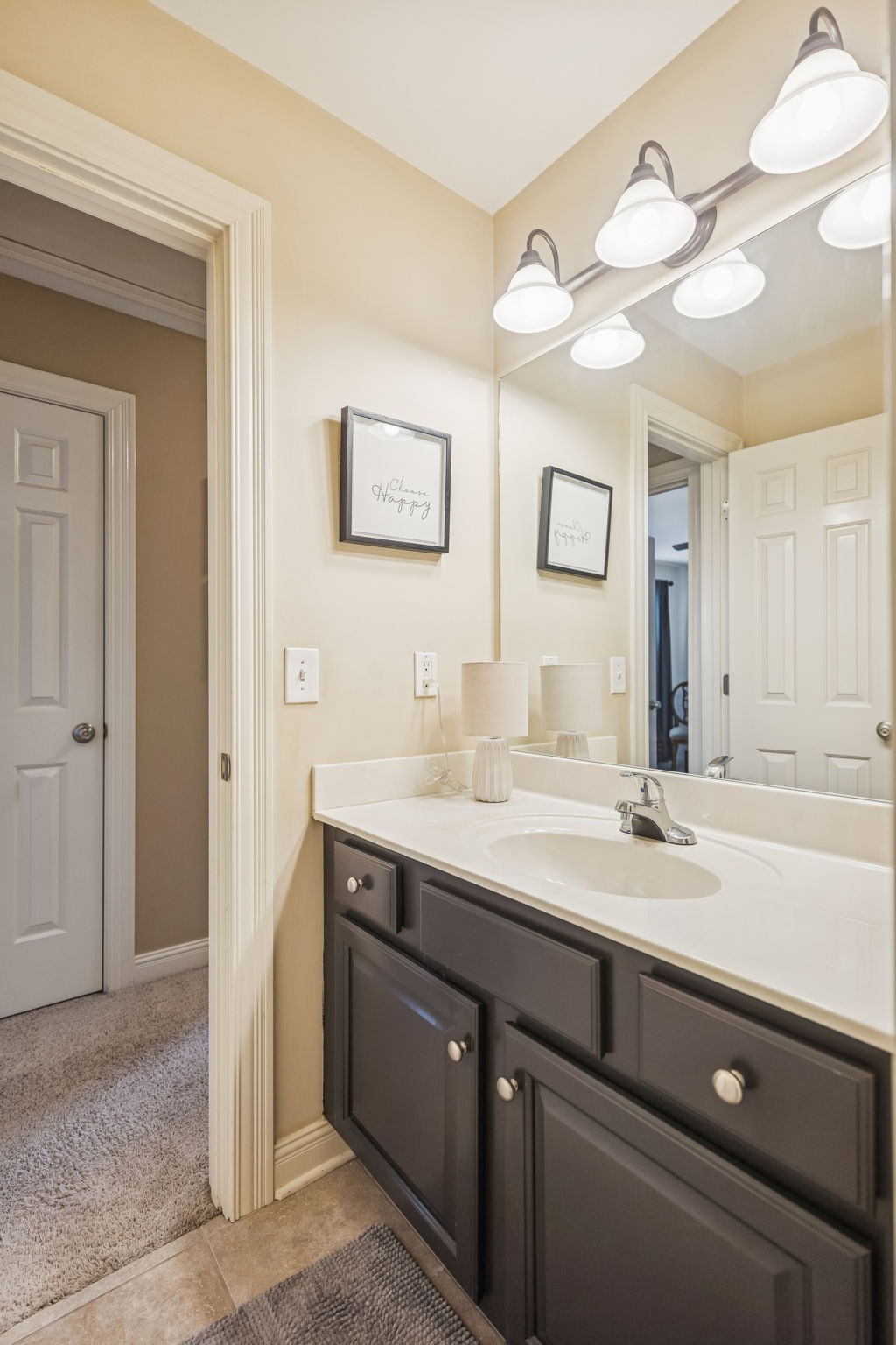 2172 Alexander Boulevard Murfreesboro, TN 37130 - Photo 29 of 46 a bathroom with a sink a light fixture and a mirror