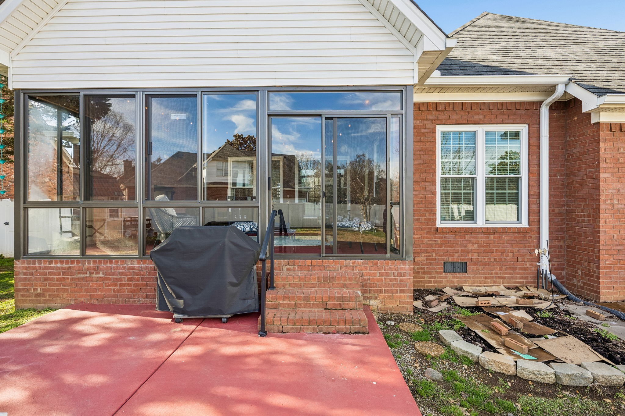 2172 Alexander Boulevard Murfreesboro, TN 37130 - Photo 38 of 46 a view of a brick house with outdoor seating