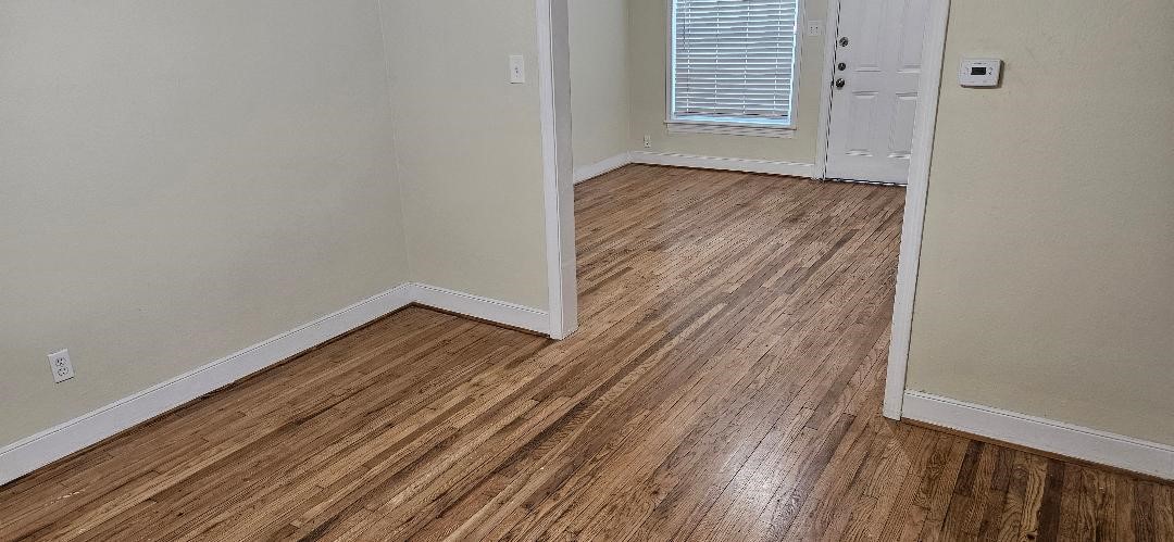 932 Walling Street Houston, TX 77009 - Photo 6 of 14 a view of wooden floor in a room