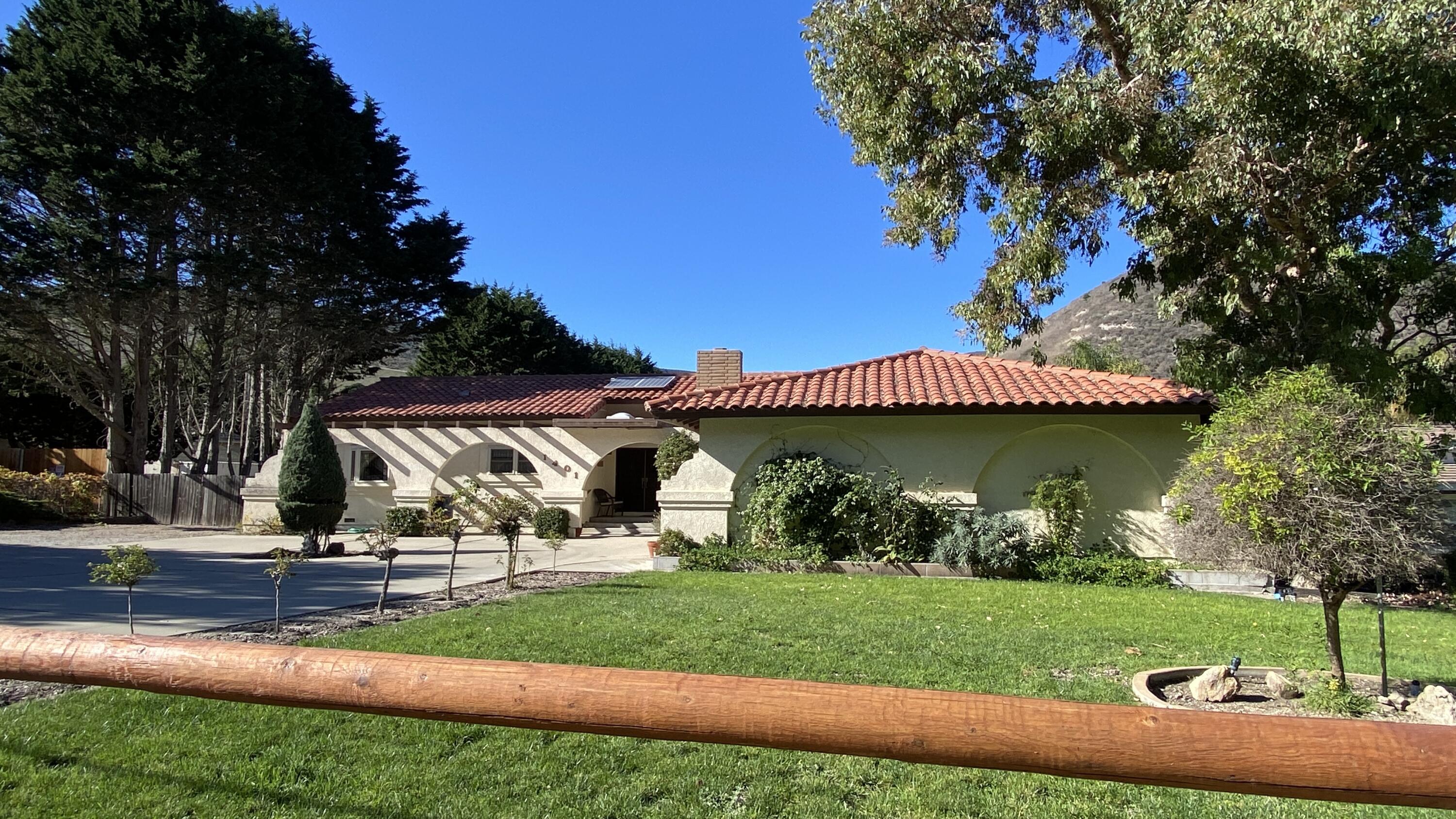 1401 San Miguelito Road Lompoc, CA 93436 - Photo 11 of 61 a view of a house with a yard