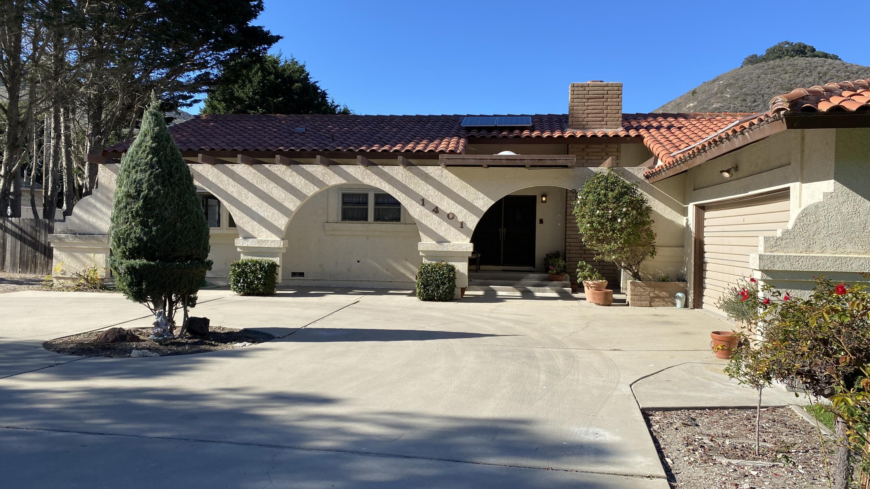 1401 San Miguelito Road Lompoc, CA 93436 - Photo 12 of 61 a front view of a house with a yard