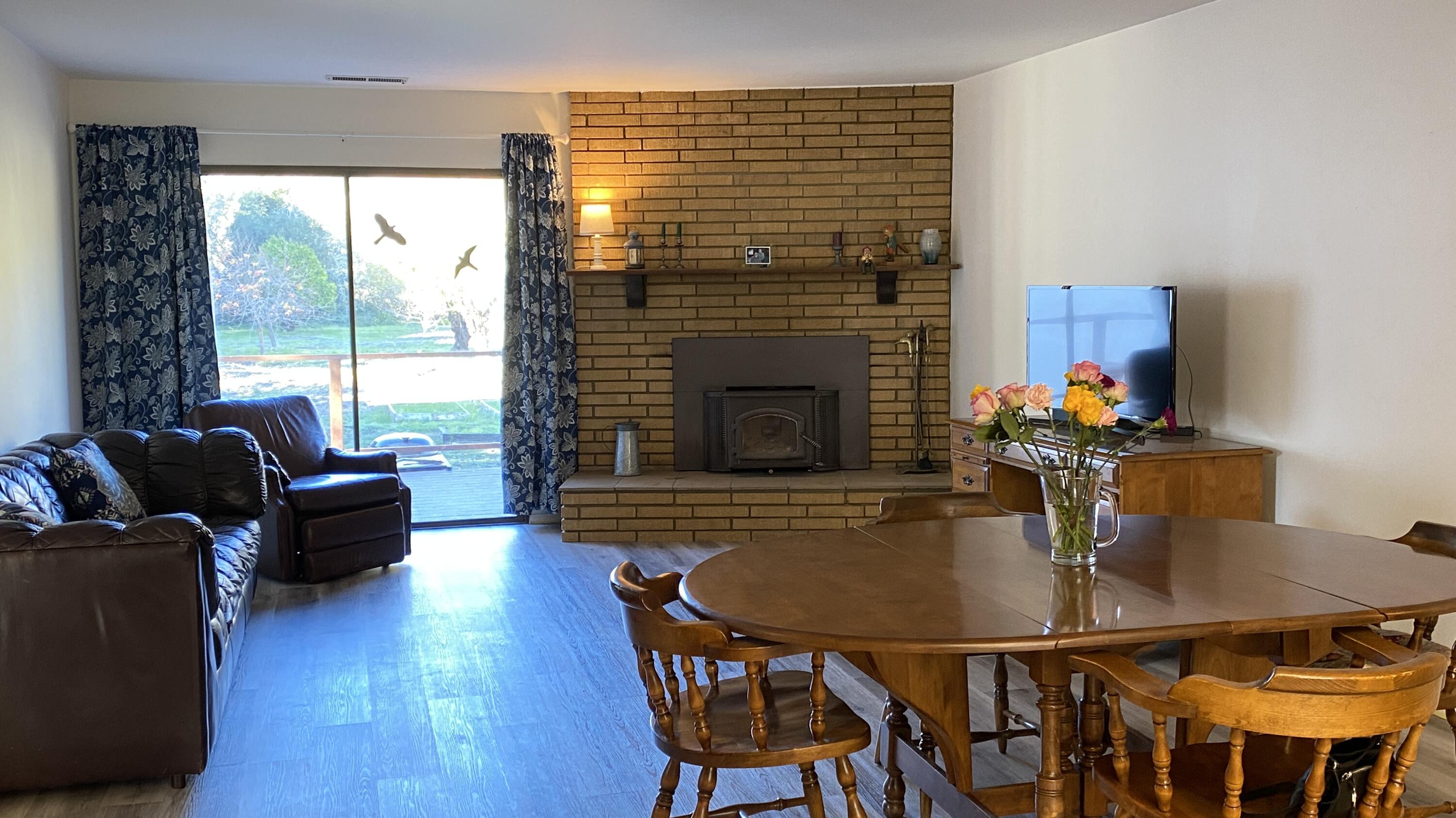 1401 San Miguelito Road Lompoc, CA 93436 - Photo 24 of 61 a dining room with furniture and wooden floor