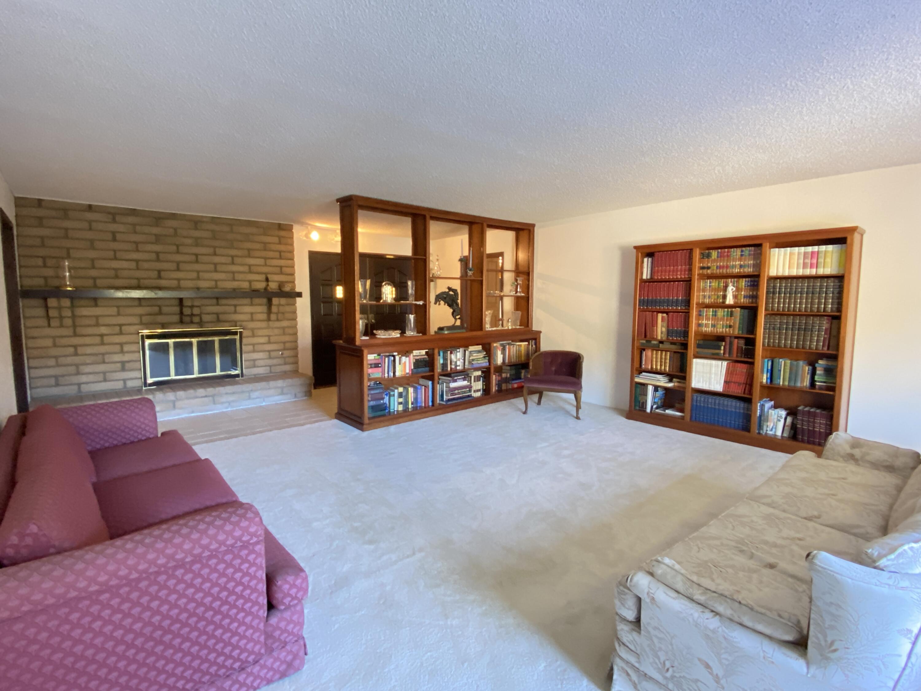 1401 San Miguelito Road Lompoc, CA 93436 - Photo 27 of 61 a living room with furniture and a fireplace
