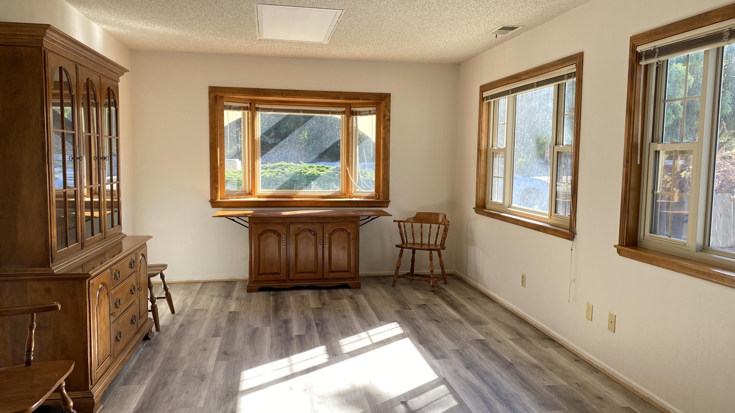 1401 San Miguelito Road Lompoc, CA 93436 - Photo 30 of 61 a view of a room with wooden floor and a window