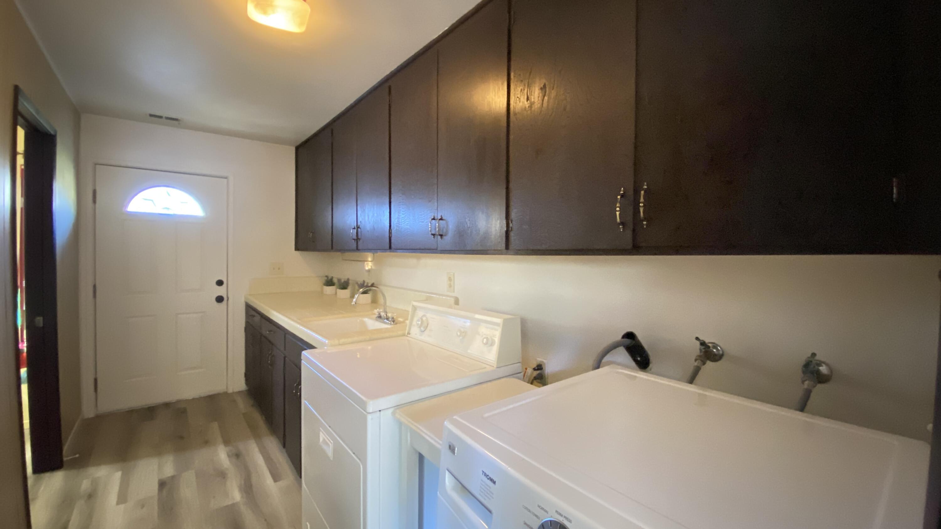 1401 San Miguelito Road Lompoc, CA 93436 - Photo 32 of 61 a utility room with dryer and washer
