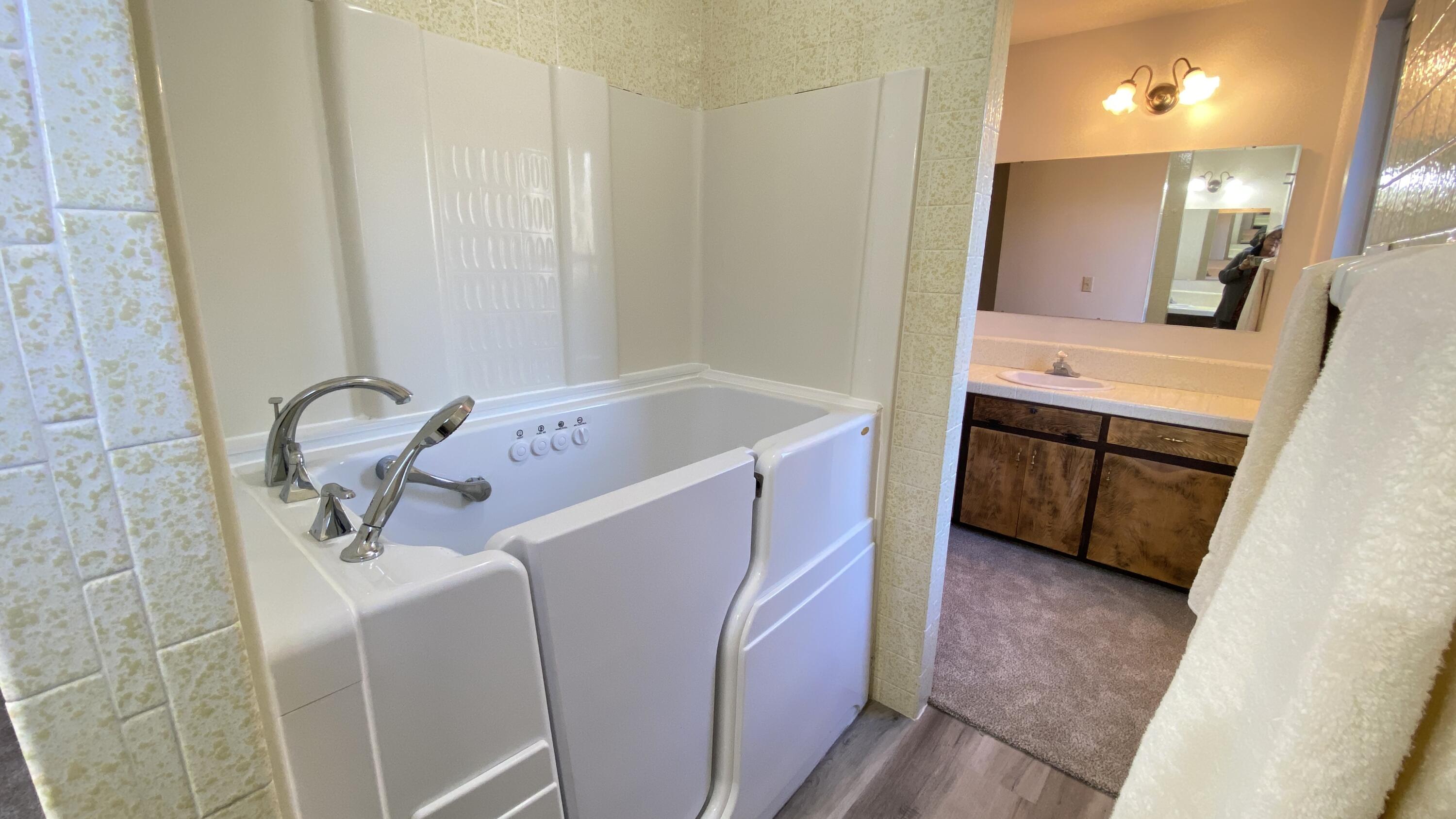 1401 San Miguelito Road Lompoc, CA 93436 - Photo 39 of 61 a bathroom with a sink a vanity and a mirror