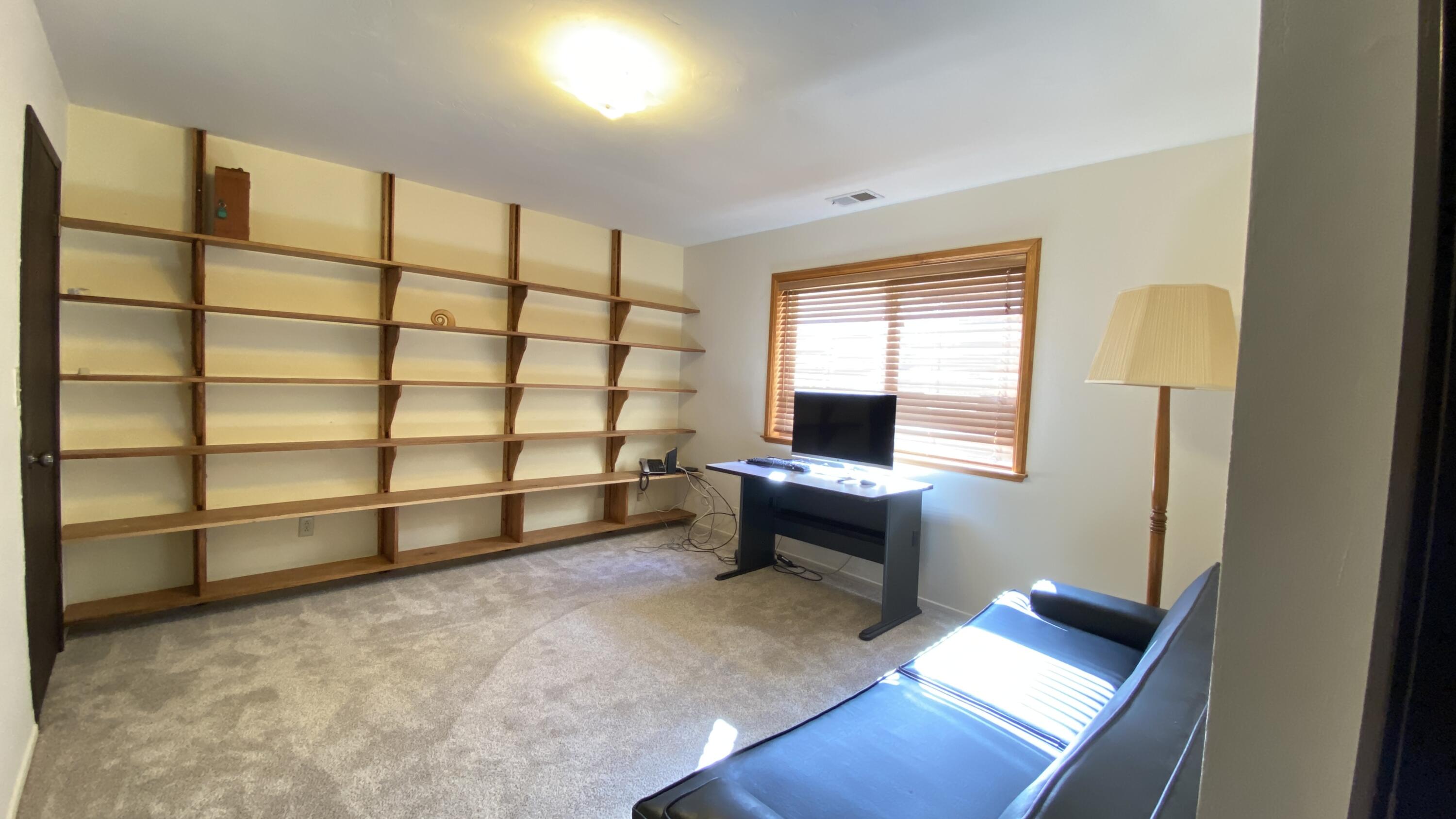 1401 San Miguelito Road Lompoc, CA 93436 - Photo 45 of 61 a living room with a couch and a window