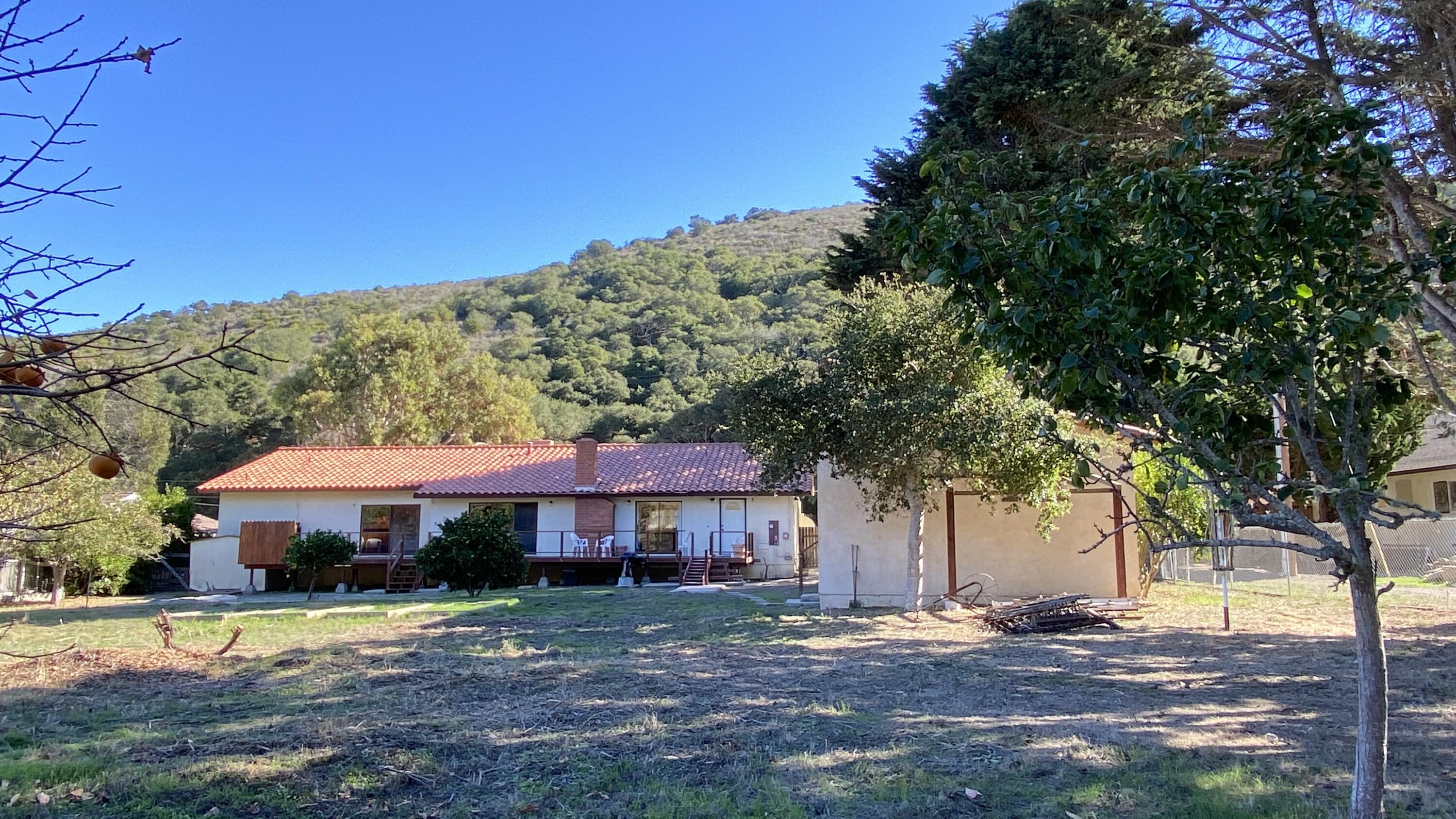 1401 San Miguelito Road Lompoc, CA 93436 - Photo 50 of 61 a front view of a house with a yard