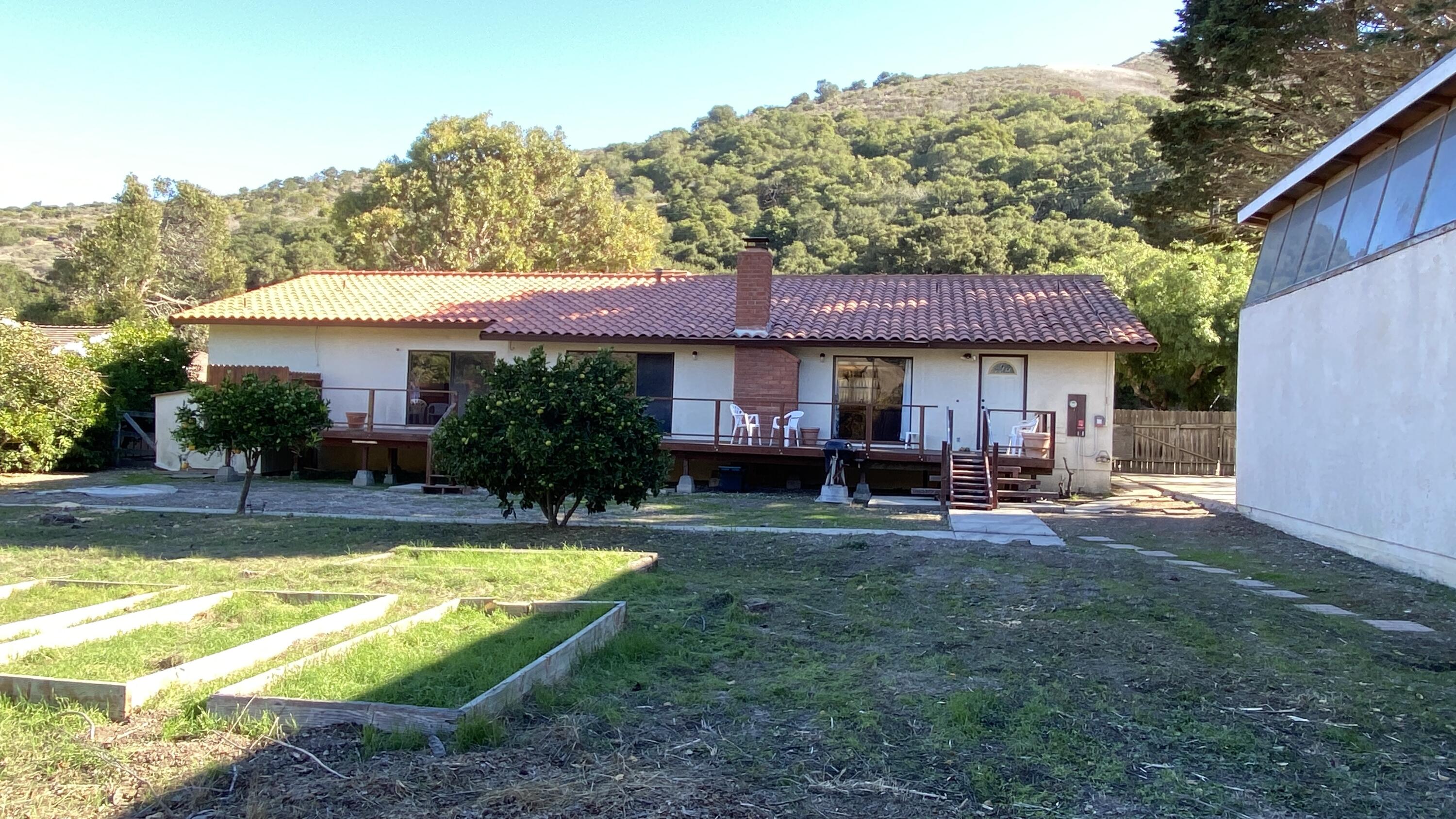 1401 San Miguelito Road Lompoc, CA 93436 - Photo 52 of 61 a view of a house with swimming pool and sitting area