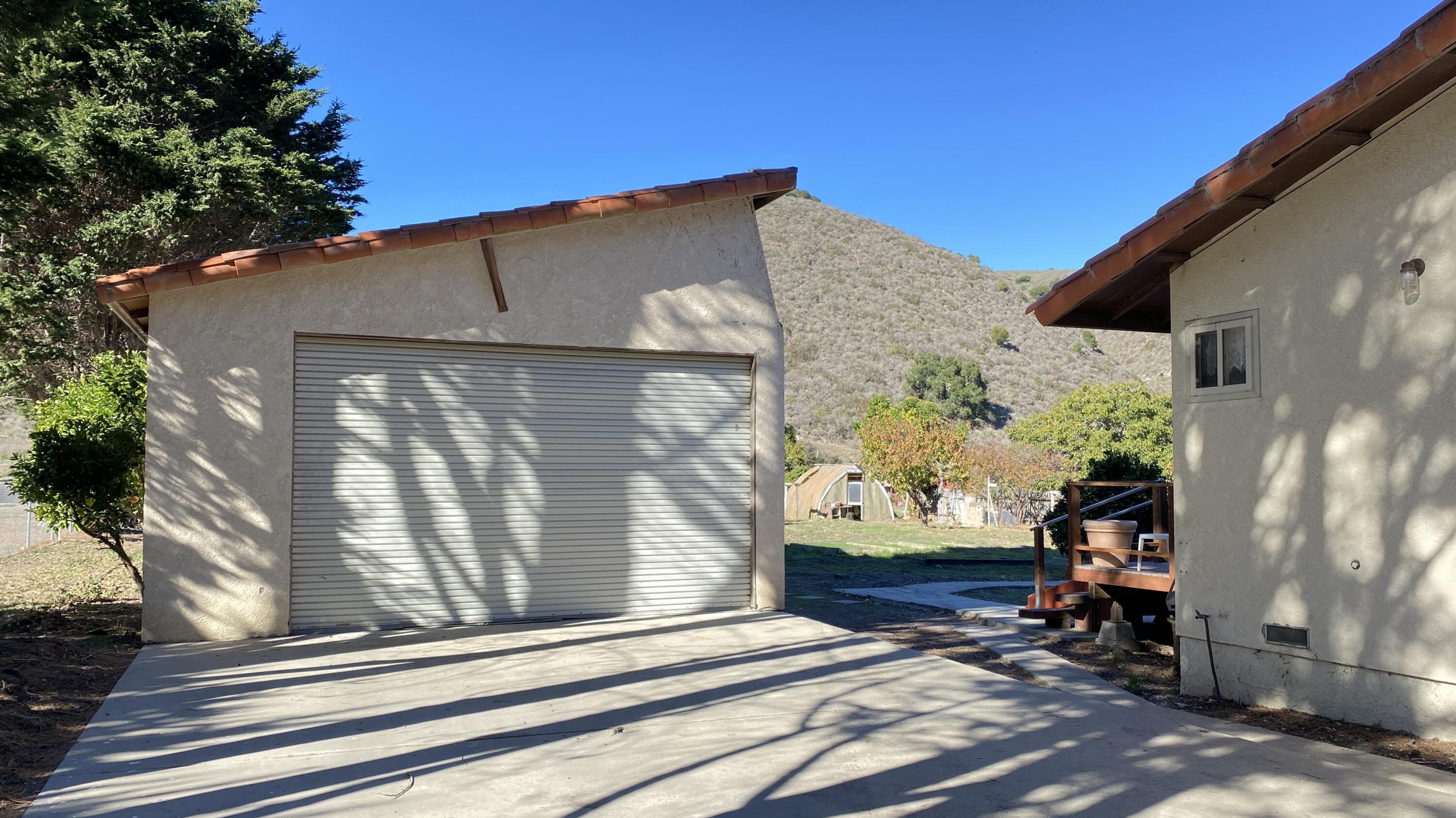 1401 San Miguelito Road Lompoc, CA 93436 - Photo 56 of 61 a side view of a house with a yard