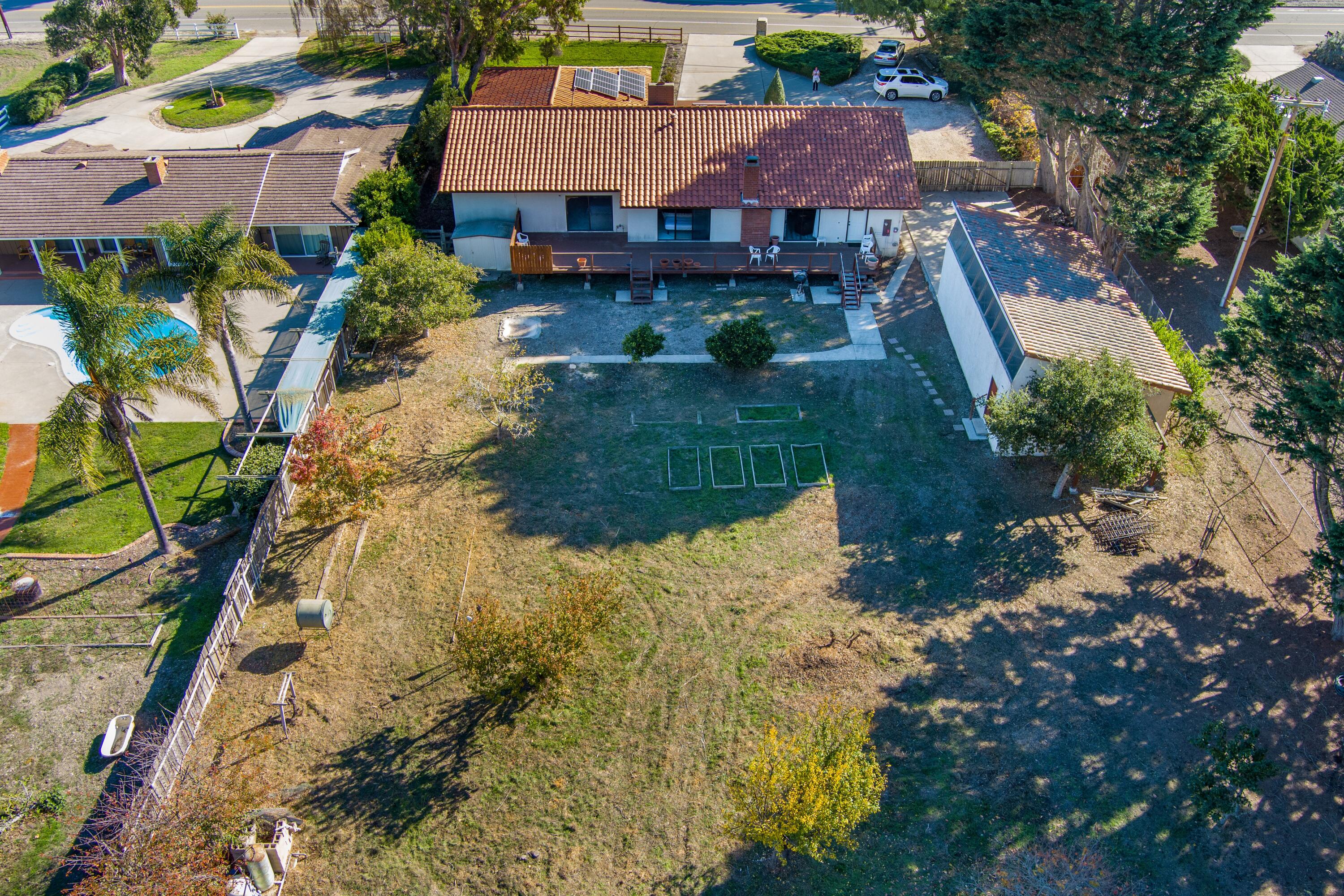 1401 San Miguelito Road Lompoc, CA 93436 - Photo 6 of 61 a aerial view of a house with a yard