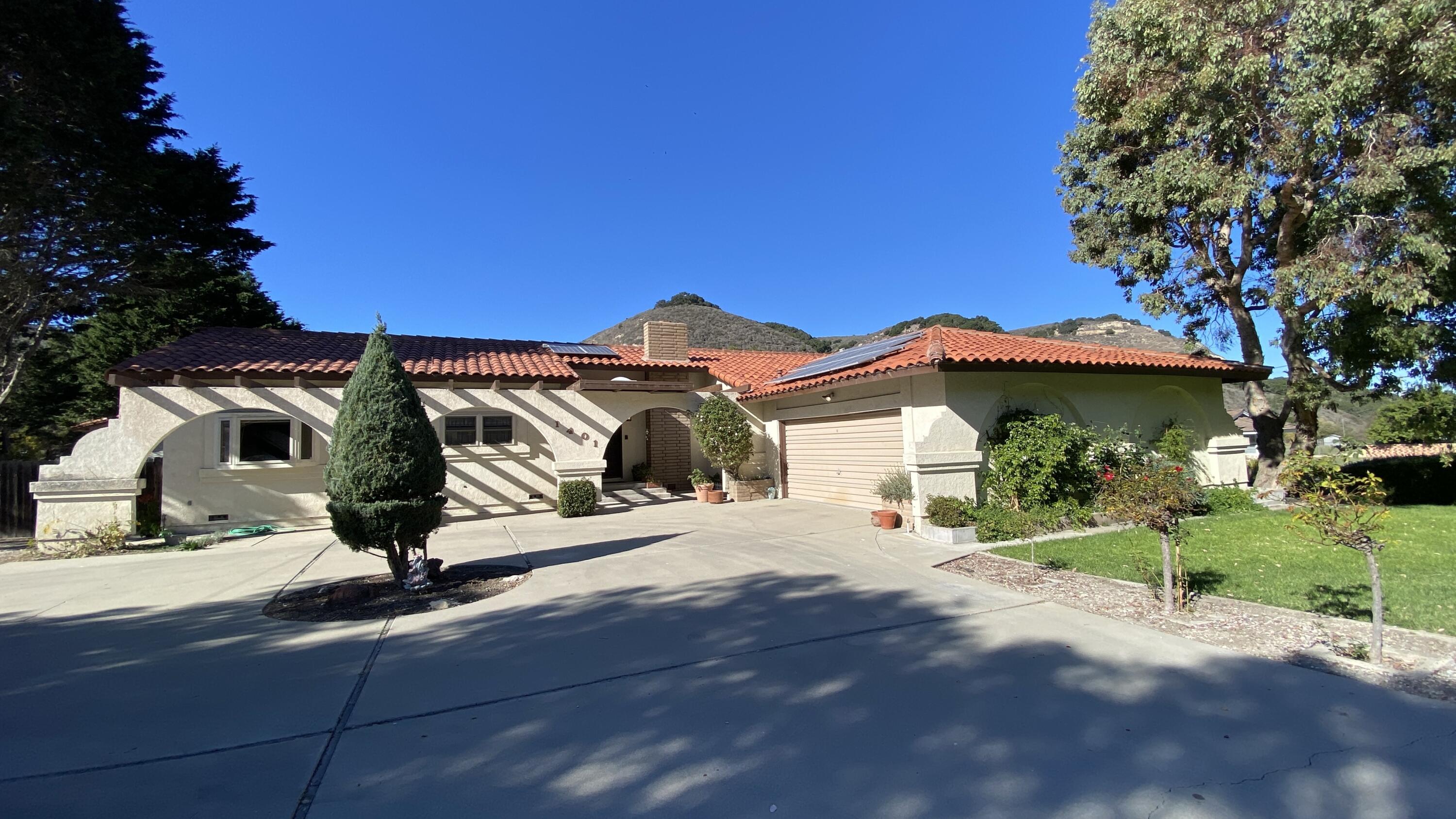 1401 San Miguelito Road Lompoc, CA 93436 - Photo 61 of 61 a view of a house with a yard and garage