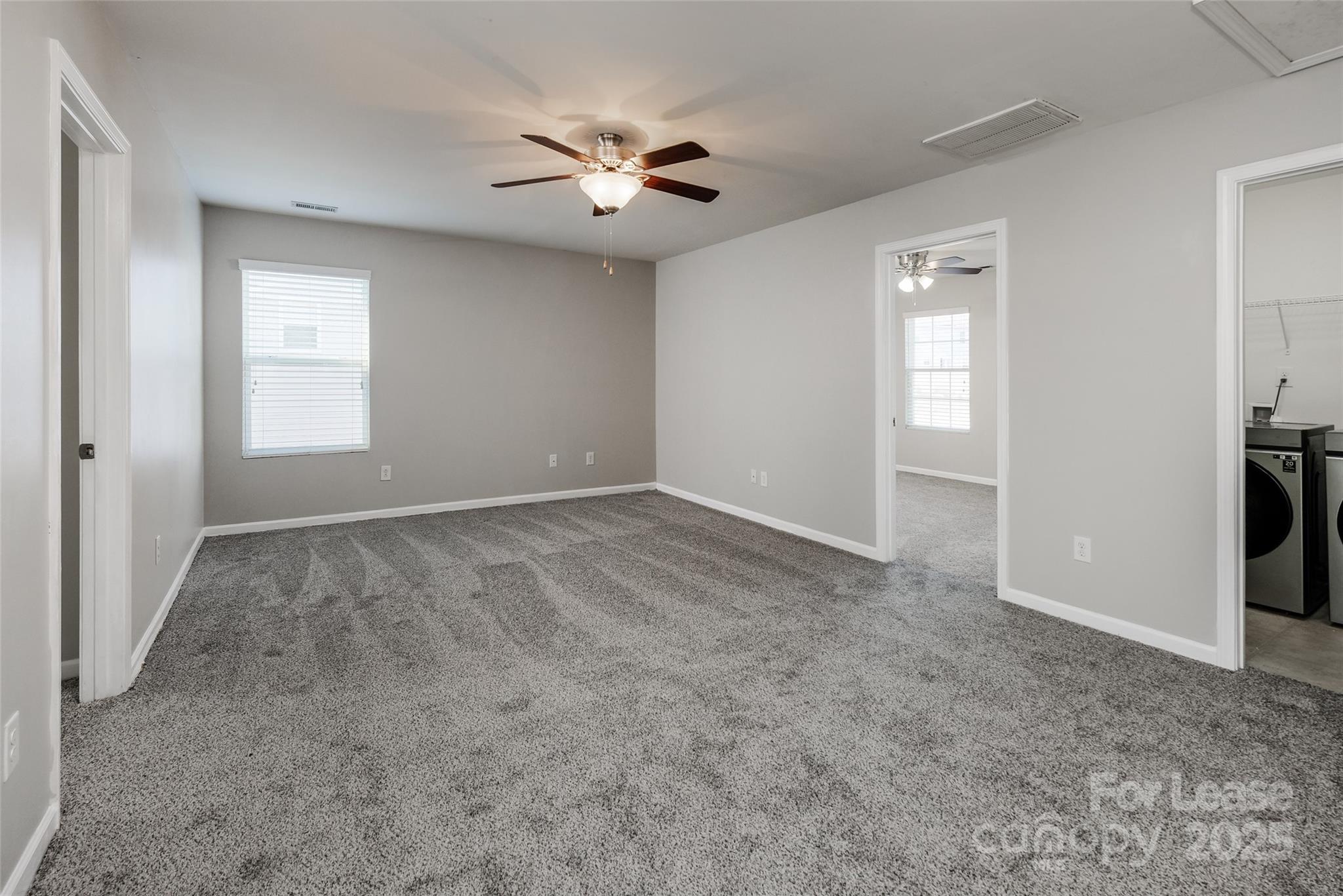 13027 Rothe House Road Charlotte, NC 28273 - Photo 14 of 31 a view of an empty room with a window