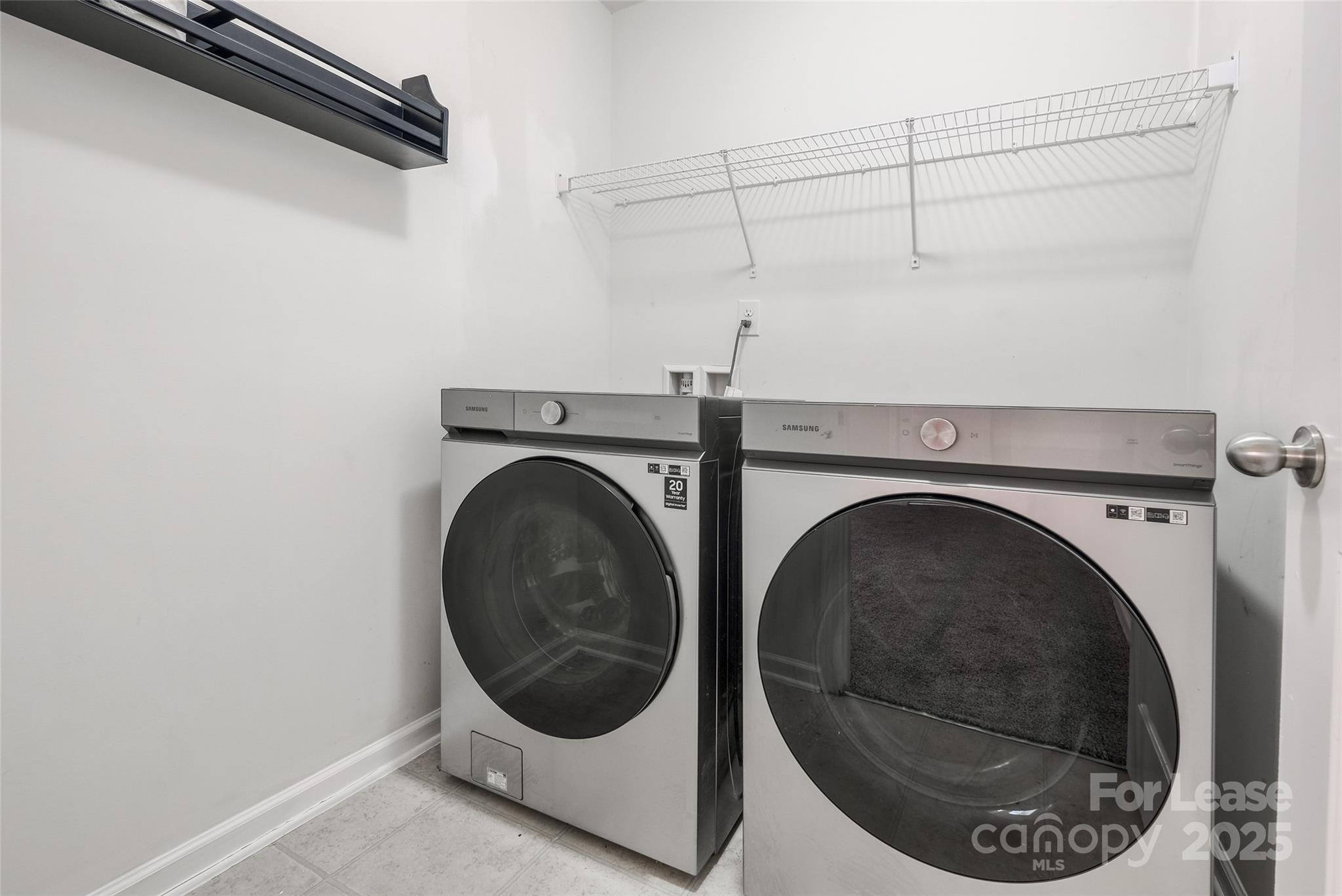 13027 Rothe House Road Charlotte, NC 28273 - Photo 15 of 31 a utility room with dryer and washer