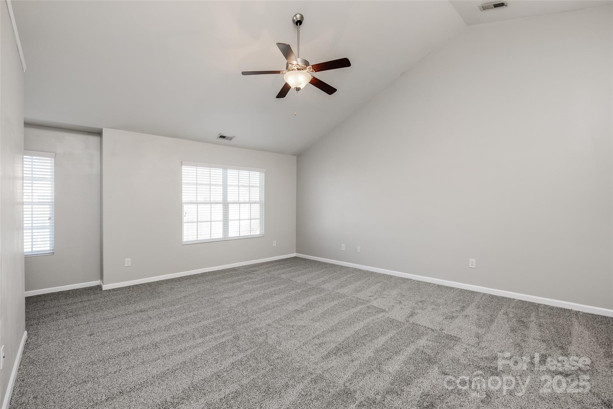 13027 Rothe House Road Charlotte, NC 28273 - Photo 17 of 31 wooden floor in an empty room with a window