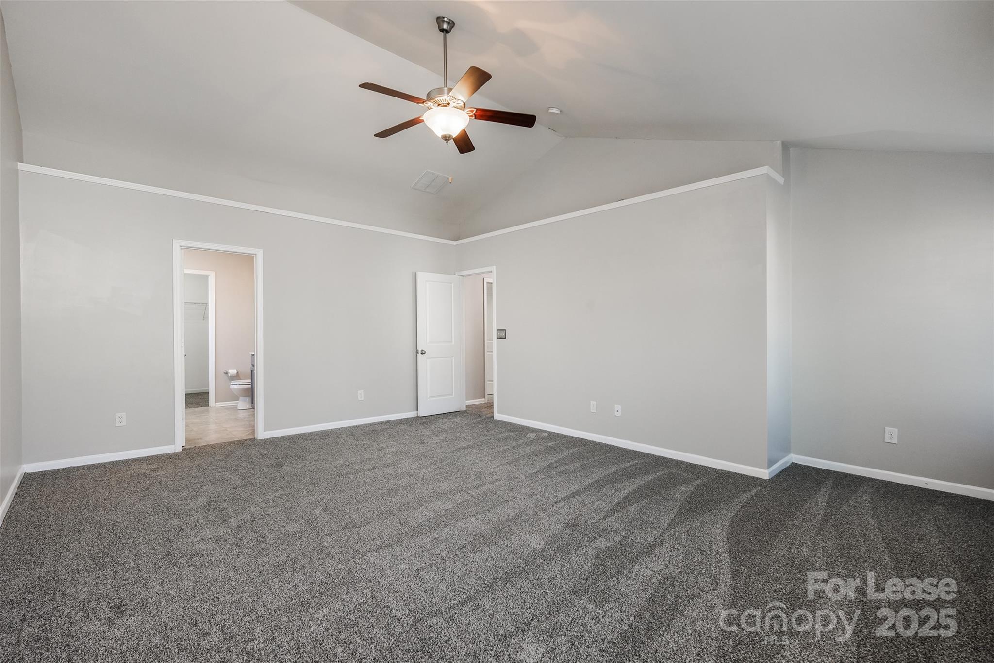 13027 Rothe House Road Charlotte, NC 28273 - Photo 19 of 31 a view of an empty room with a fan