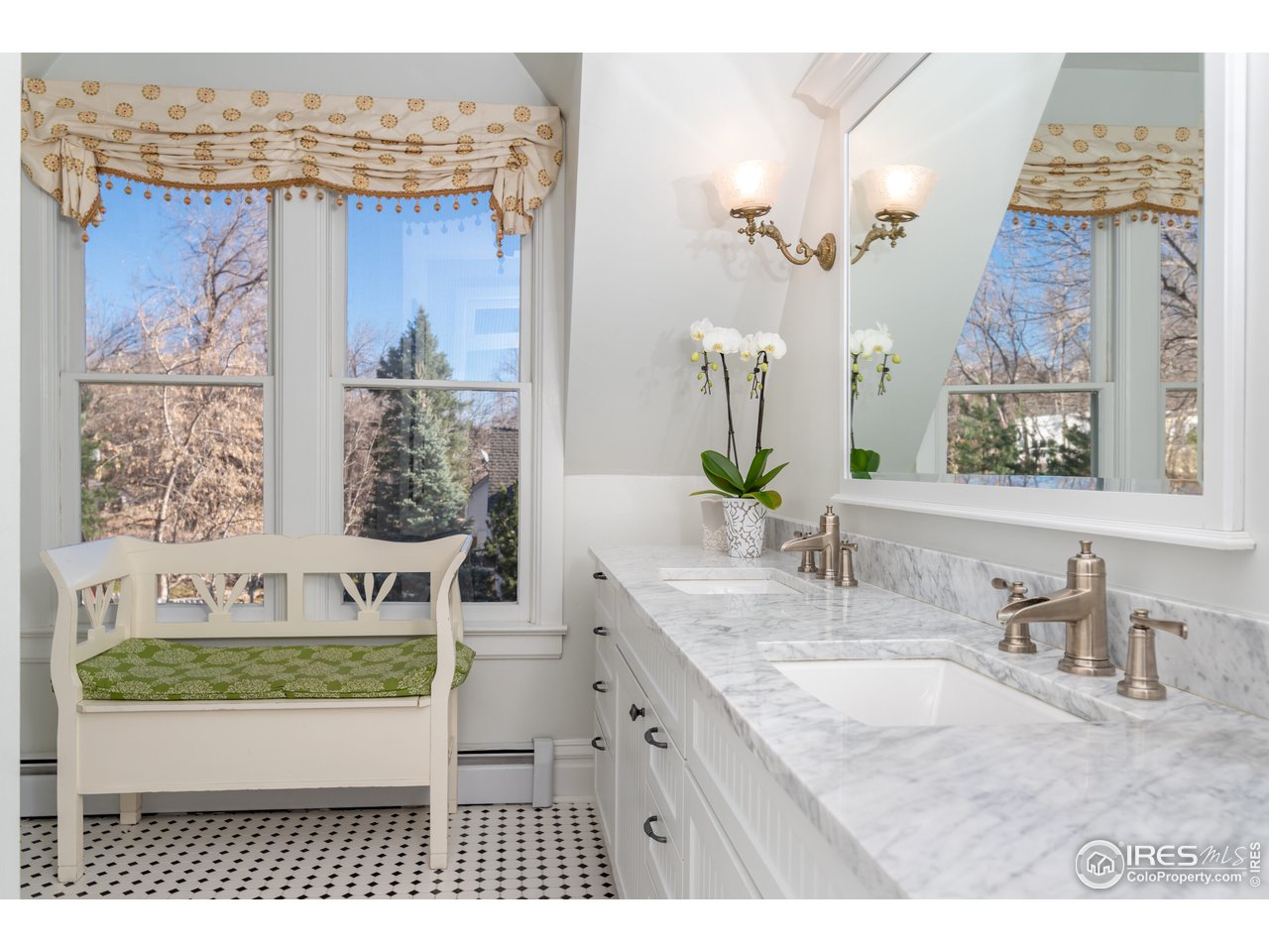 809 Pine Street Boulder, CO 80302 - Photo 17 of 38 a bathroom with a granite countertop sink mirror and vanity