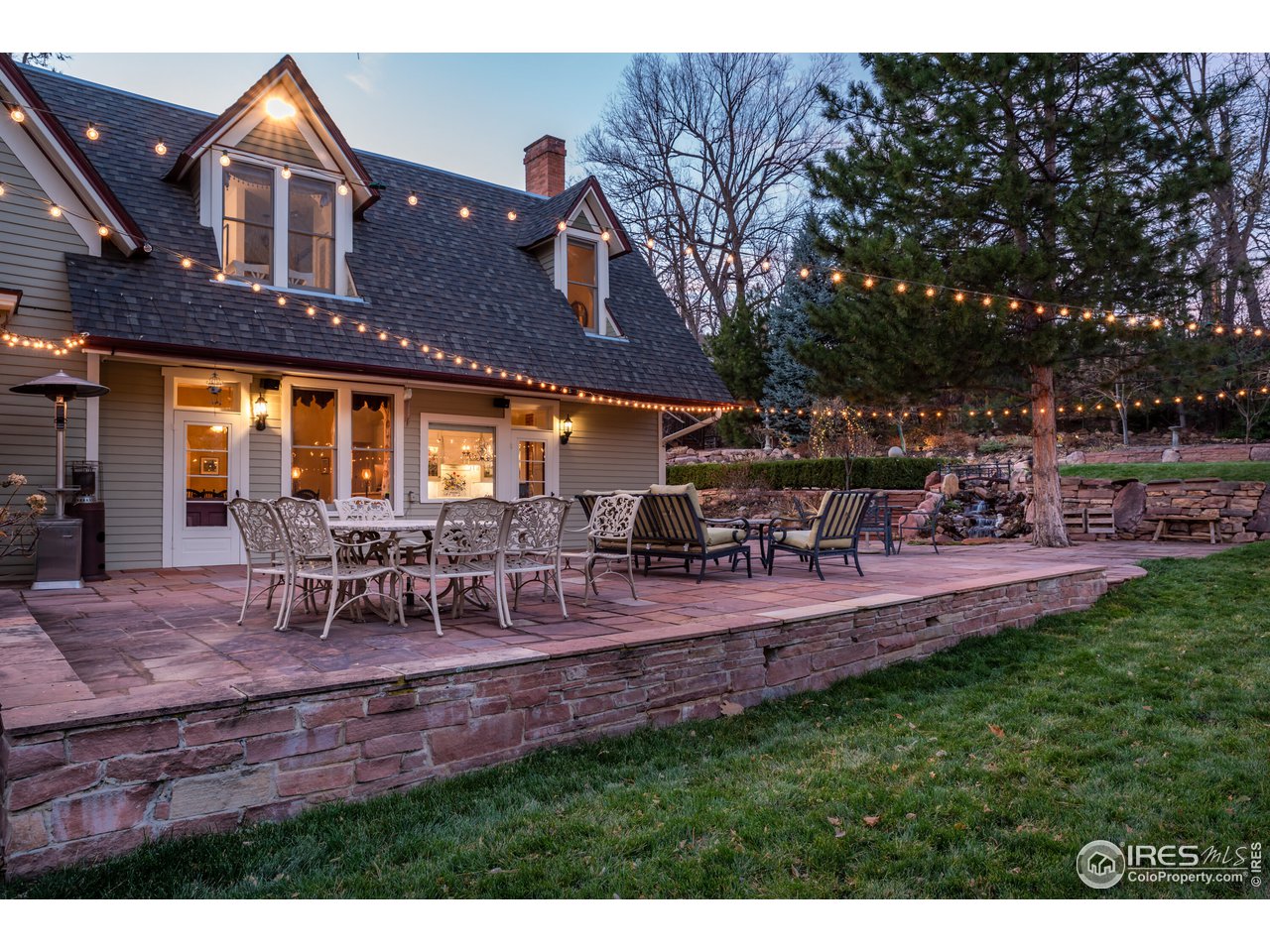 809 Pine Street Boulder, CO 80302 - Photo 28 of 38 a view of a house with backyard and sitting area