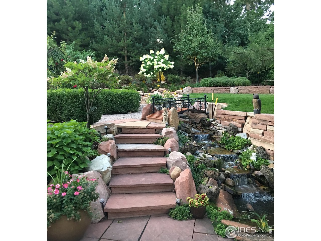 809 Pine Street Boulder, CO 80302 - Photo 35 of 38 a view of a garden with flowers