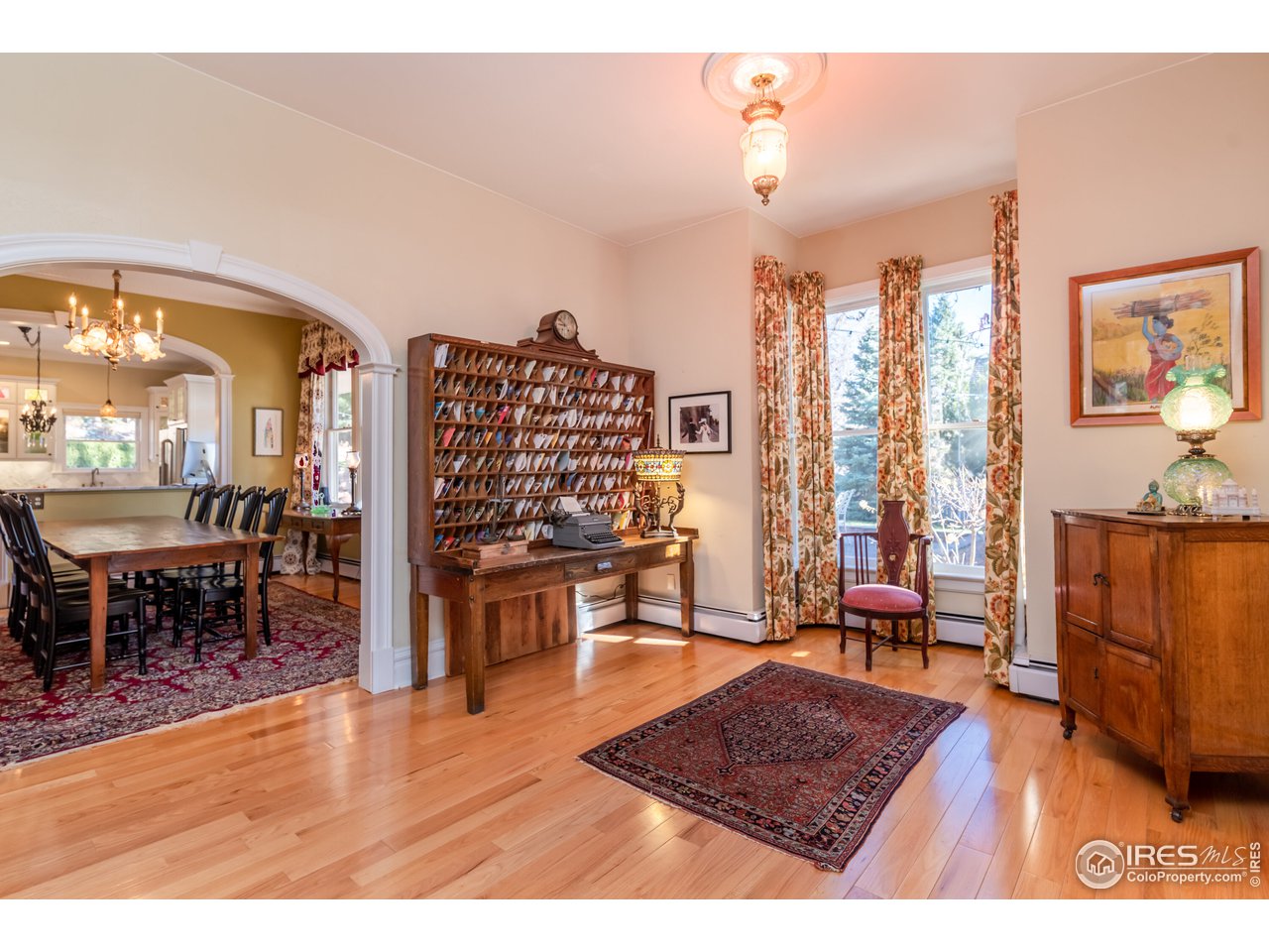 809 Pine Street Boulder, CO 80302 - Photo 4 of 38 a living room with furniture a rug and a table