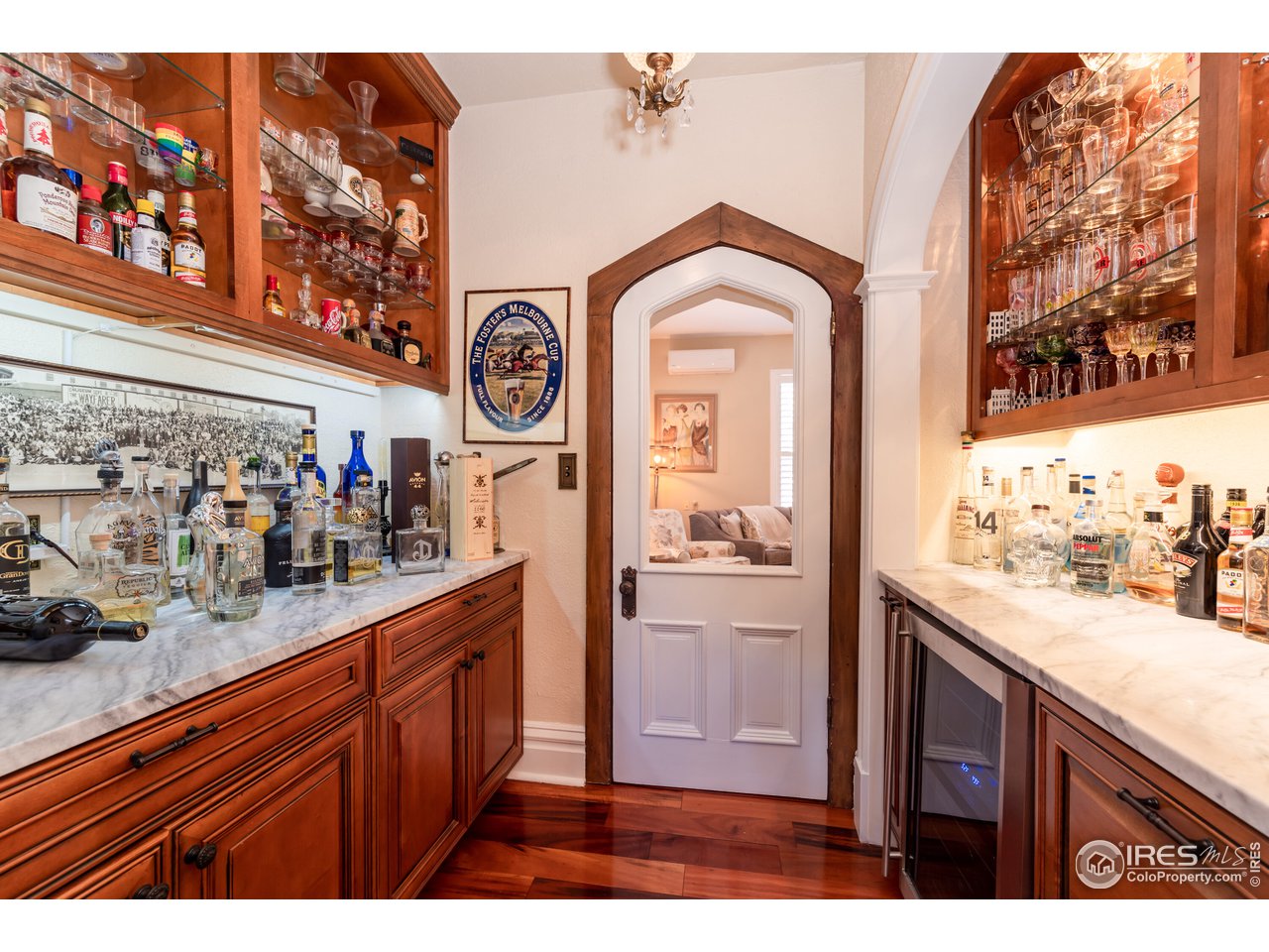 809 Pine Street Boulder, CO 80302 - Photo 10 of 38 a view of living room with granite countertop stainless steel appliances and fireplace