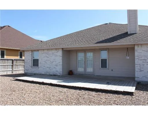 a house view with a backyard