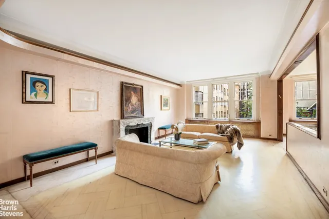 a view of a hallway with a chandelier
