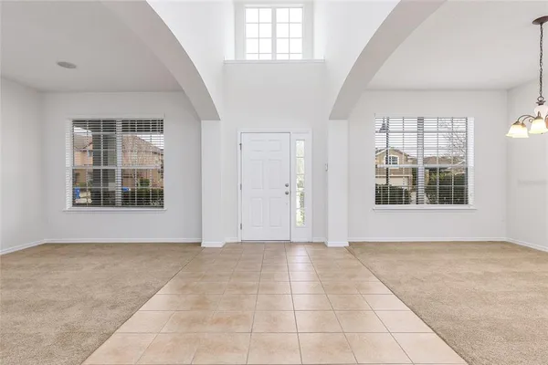 an empty room with windows