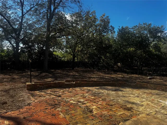 a view of backyard with green space