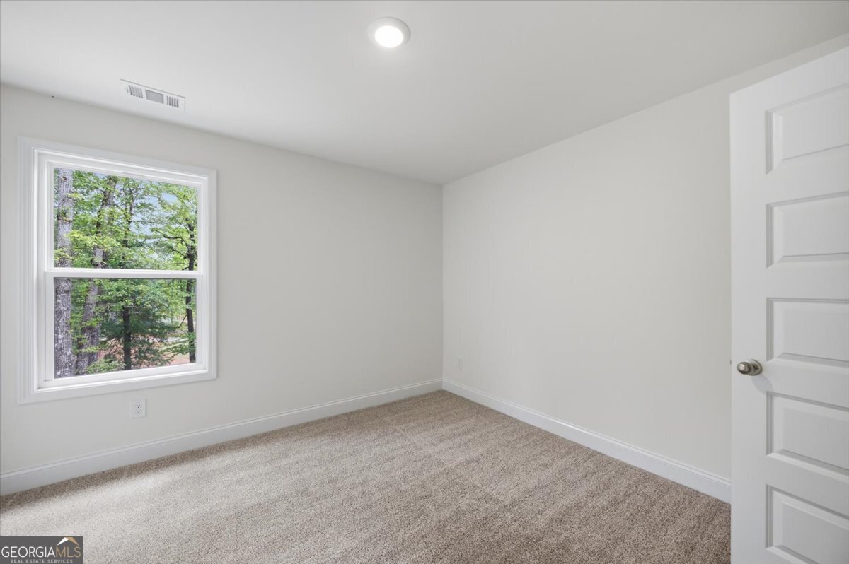 2778 Boxankle Road Forsyth, GA 31029 - Photo 18 of 21 an empty room with windows