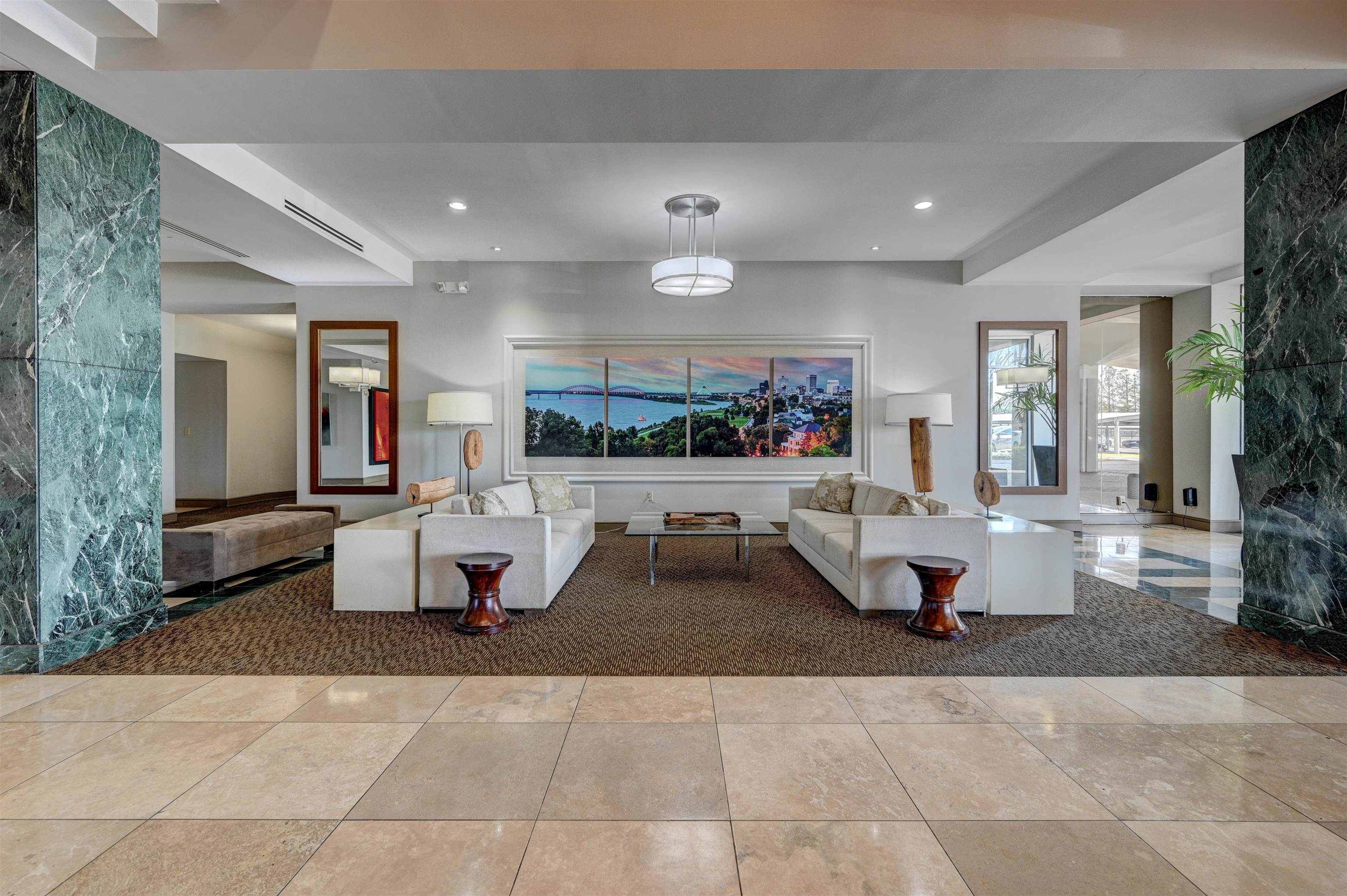 655 Riverside Drive, Unit 606A Memphis, TN 38103 - Photo 22 of 35 a living room with furniture and a large window