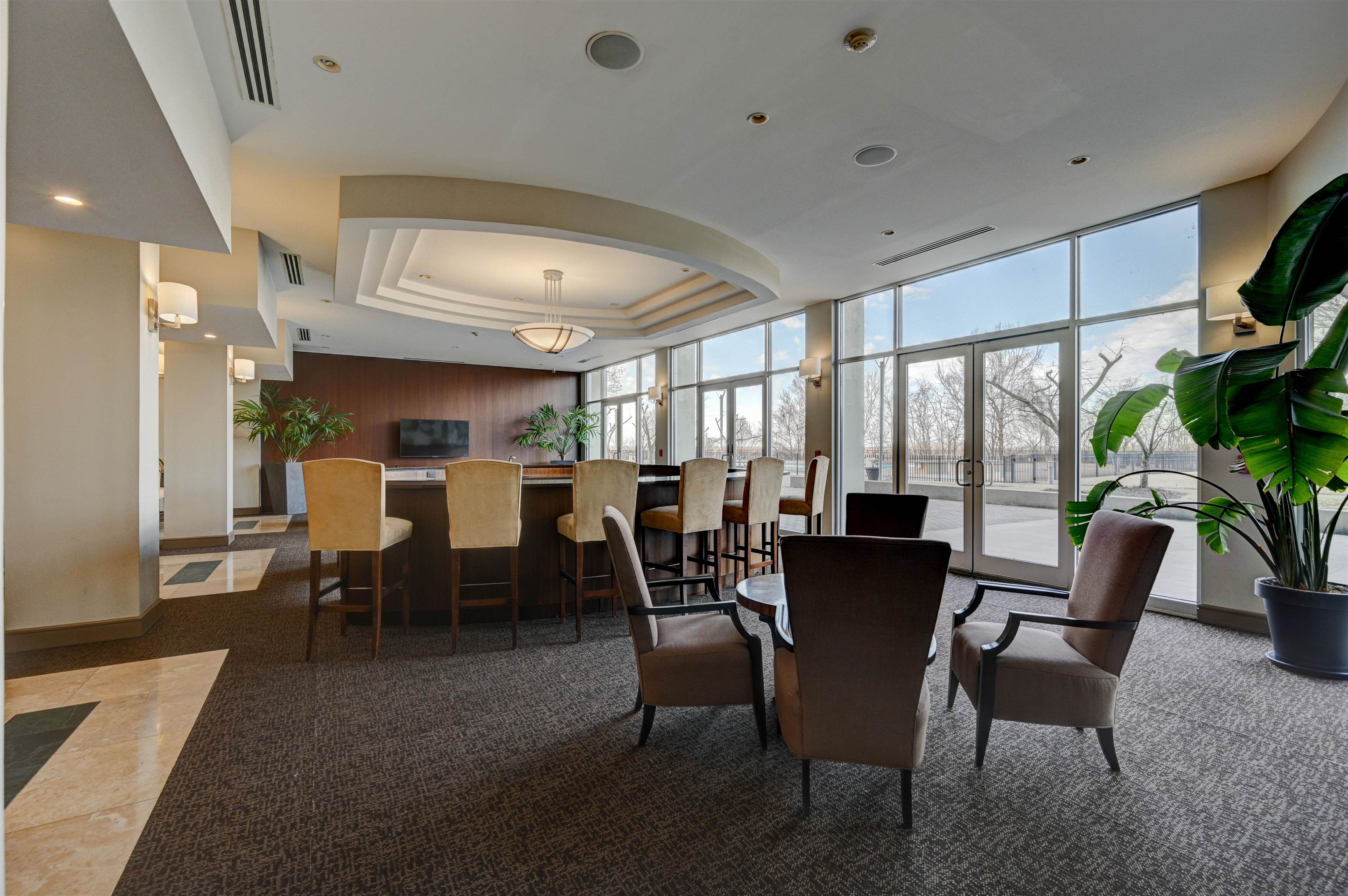 655 Riverside Drive, Unit 606A Memphis, TN 38103 - Photo 29 of 35 a dining room with furniture window and wooden floor