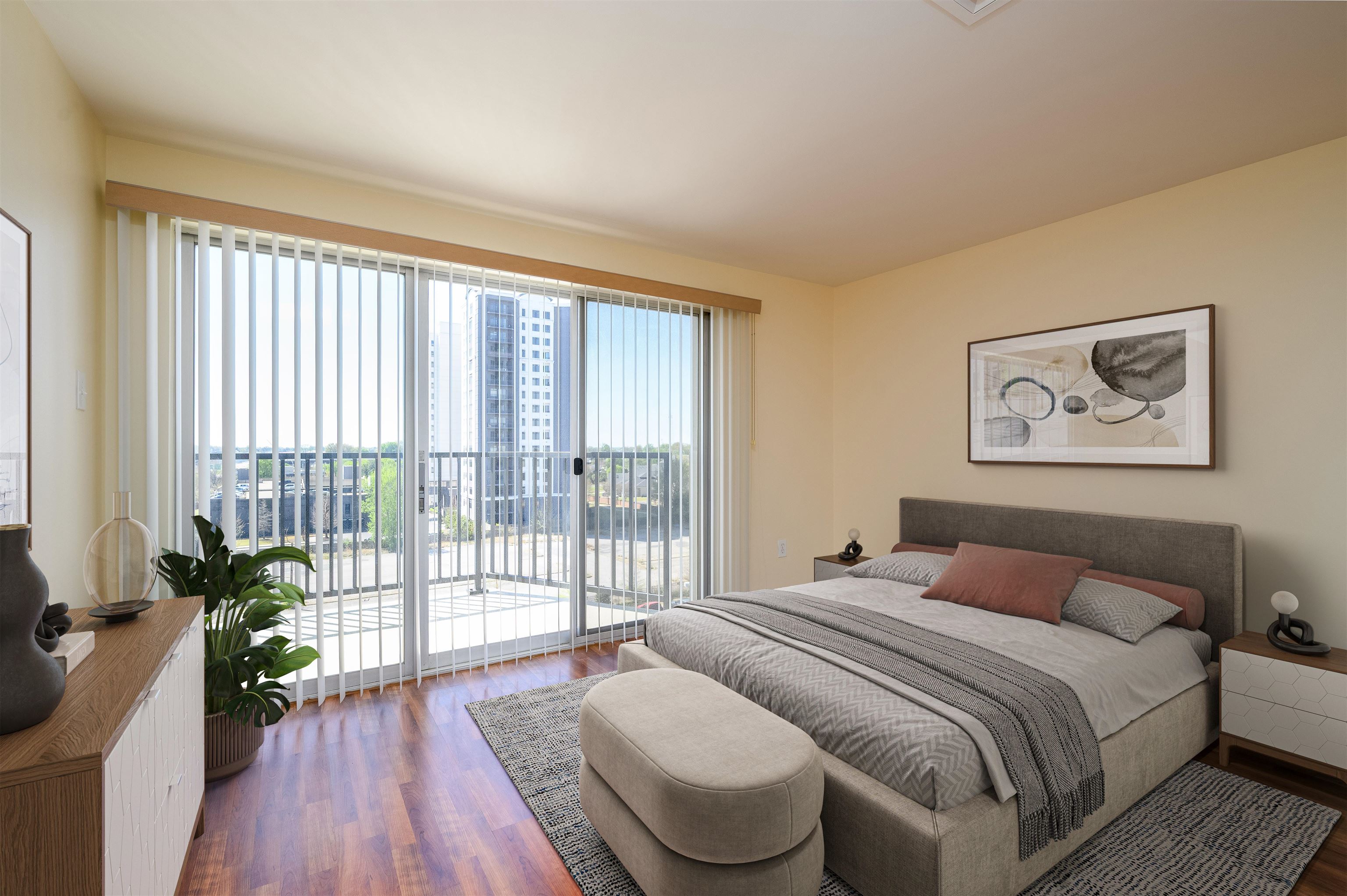 655 Riverside Drive, Unit 606A Memphis, TN 38103 - Photo 35 of 35 a bedroom with a balcony a bed and a large window