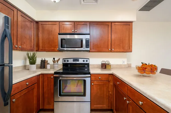 a view of kitchen and wooden floor