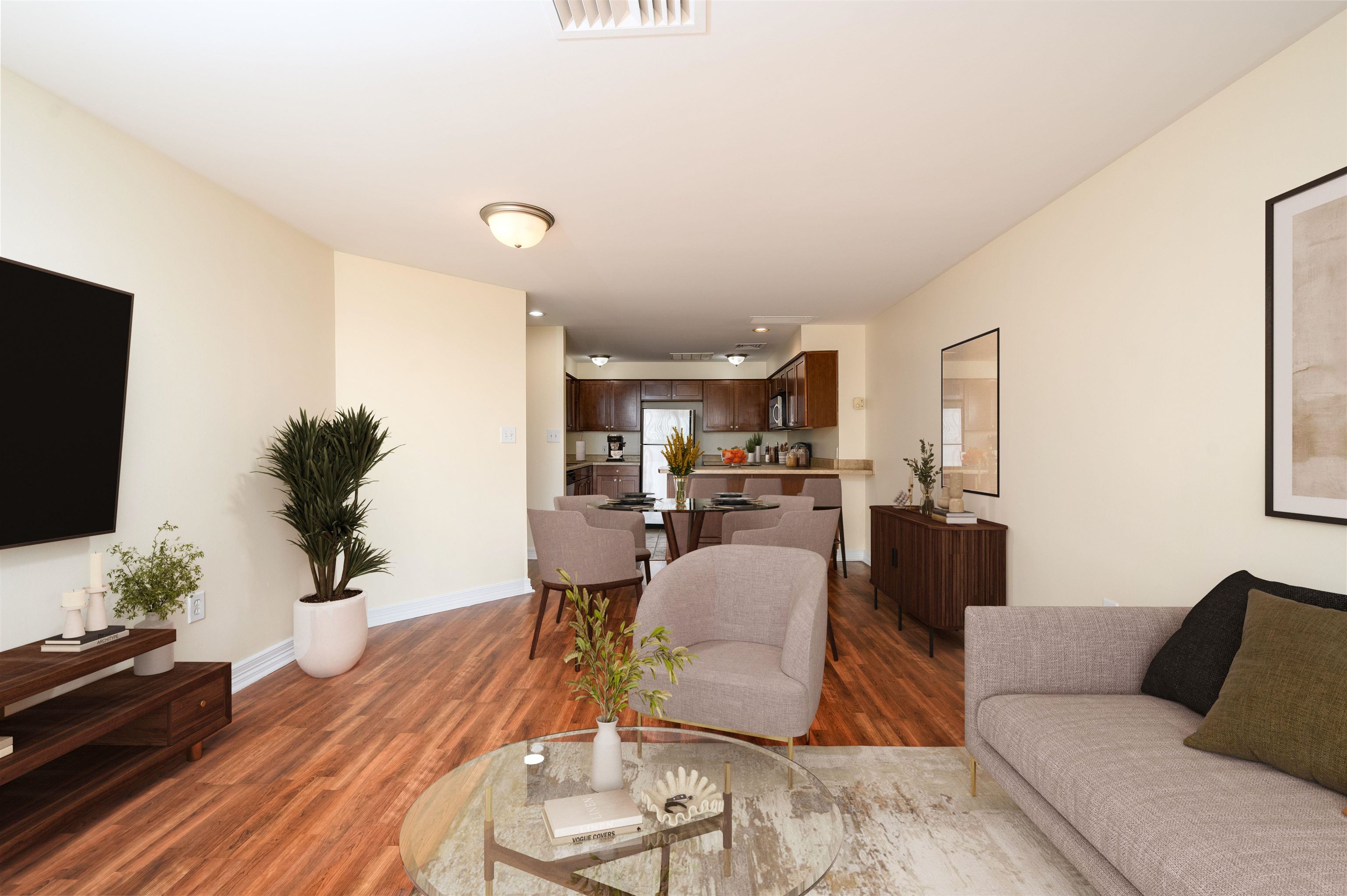 655 Riverside Drive, Unit 606A Memphis, TN 38103 - Photo 8 of 35 a living room with furniture and a flat screen tv