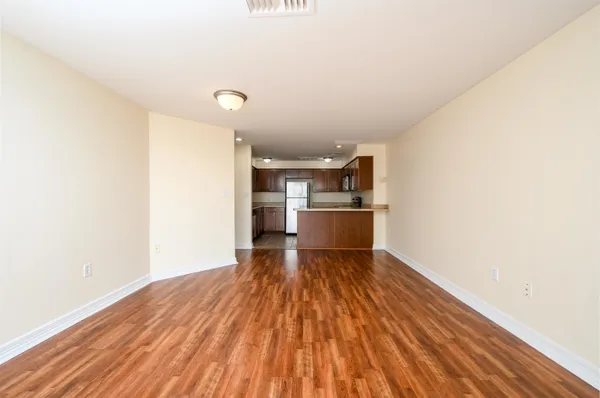 a view of a livingroom with wooden floor