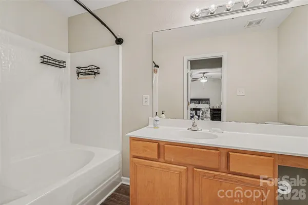 a bathroom with a sink and a bathtub